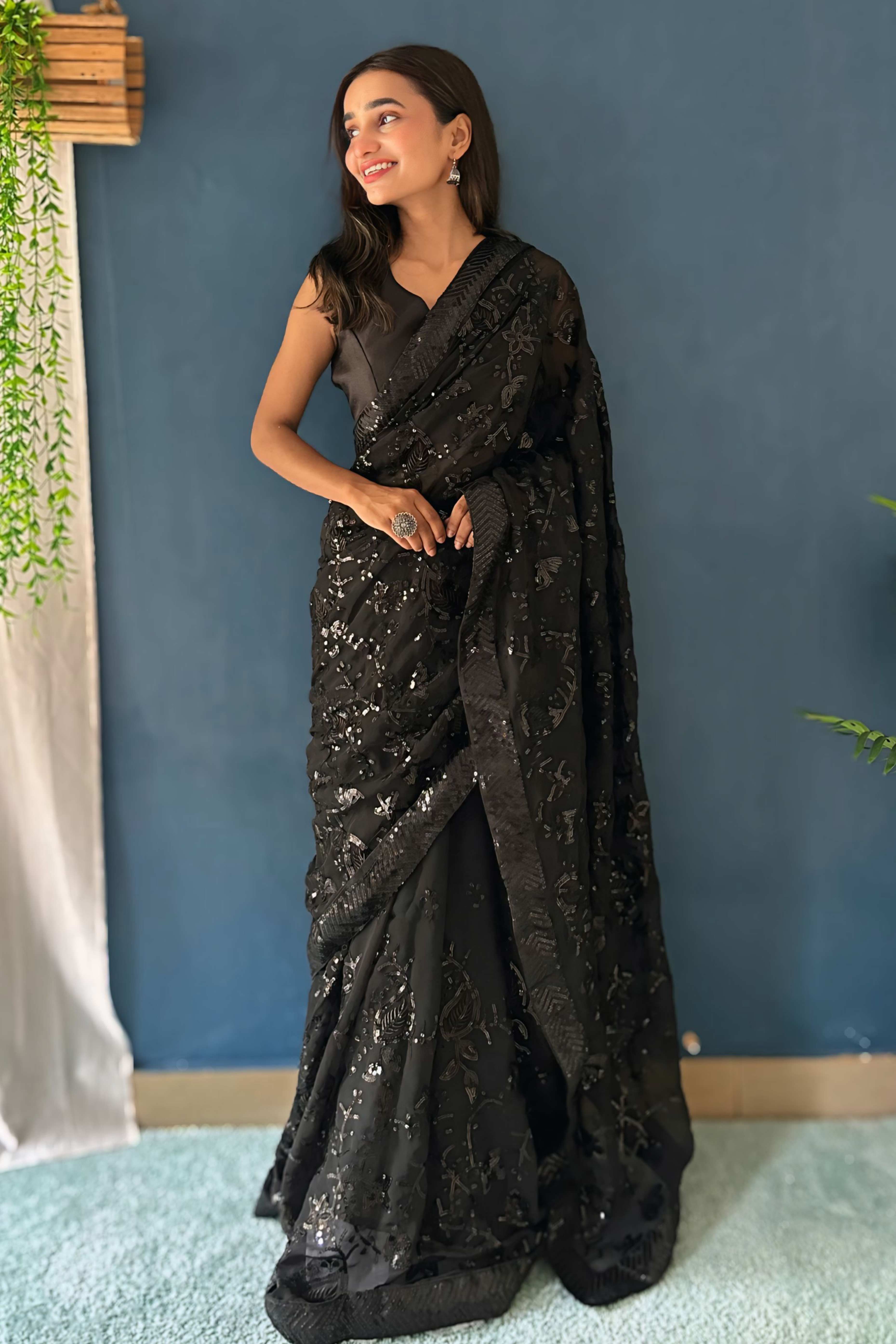 Black Sequins Embellished Georgette Saree with Delicate Embroidery and Sheer Grace