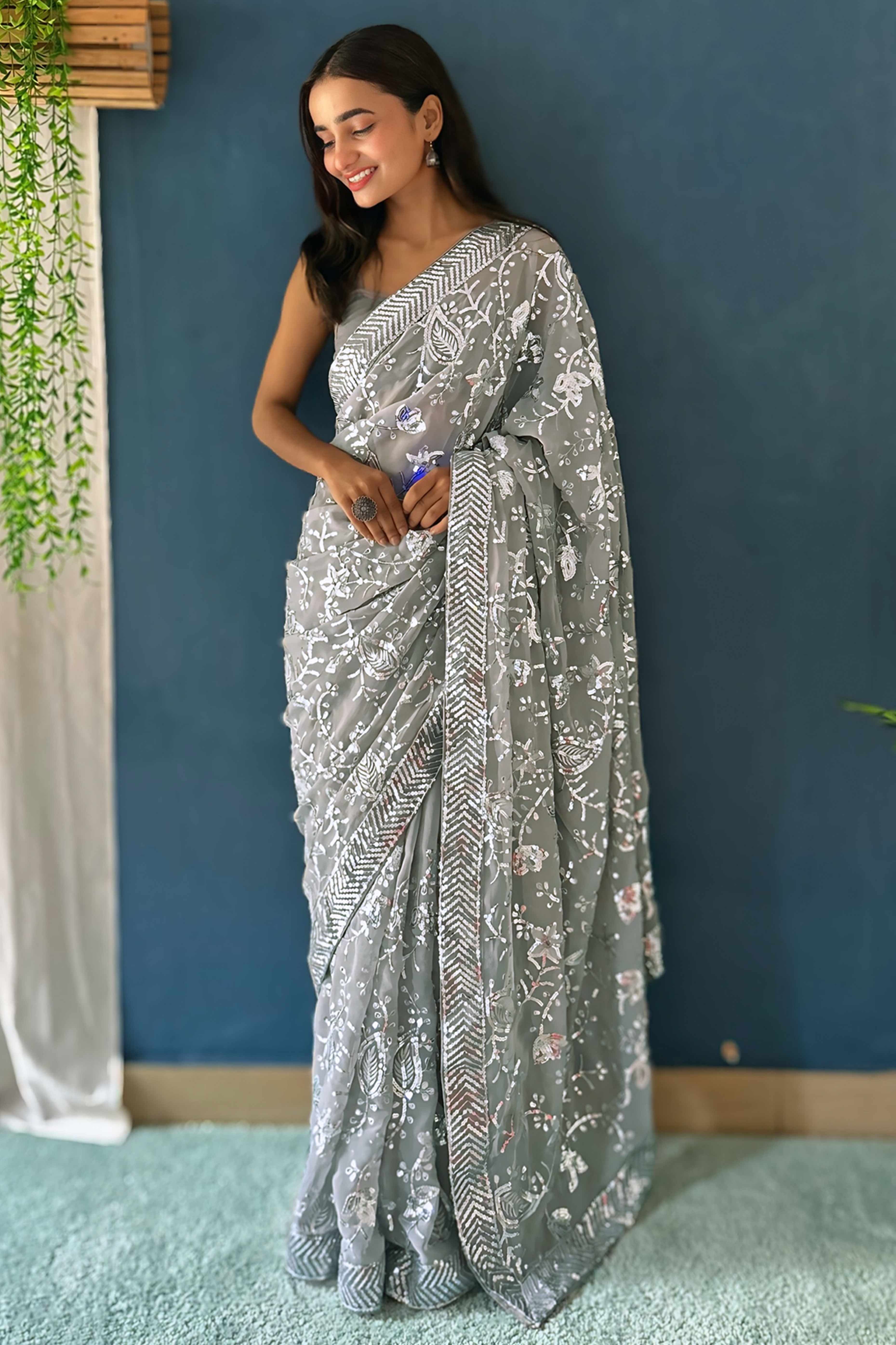 Grey Sequins Embellished Georgette Saree with Delicate Embroidery and Sheer Grace