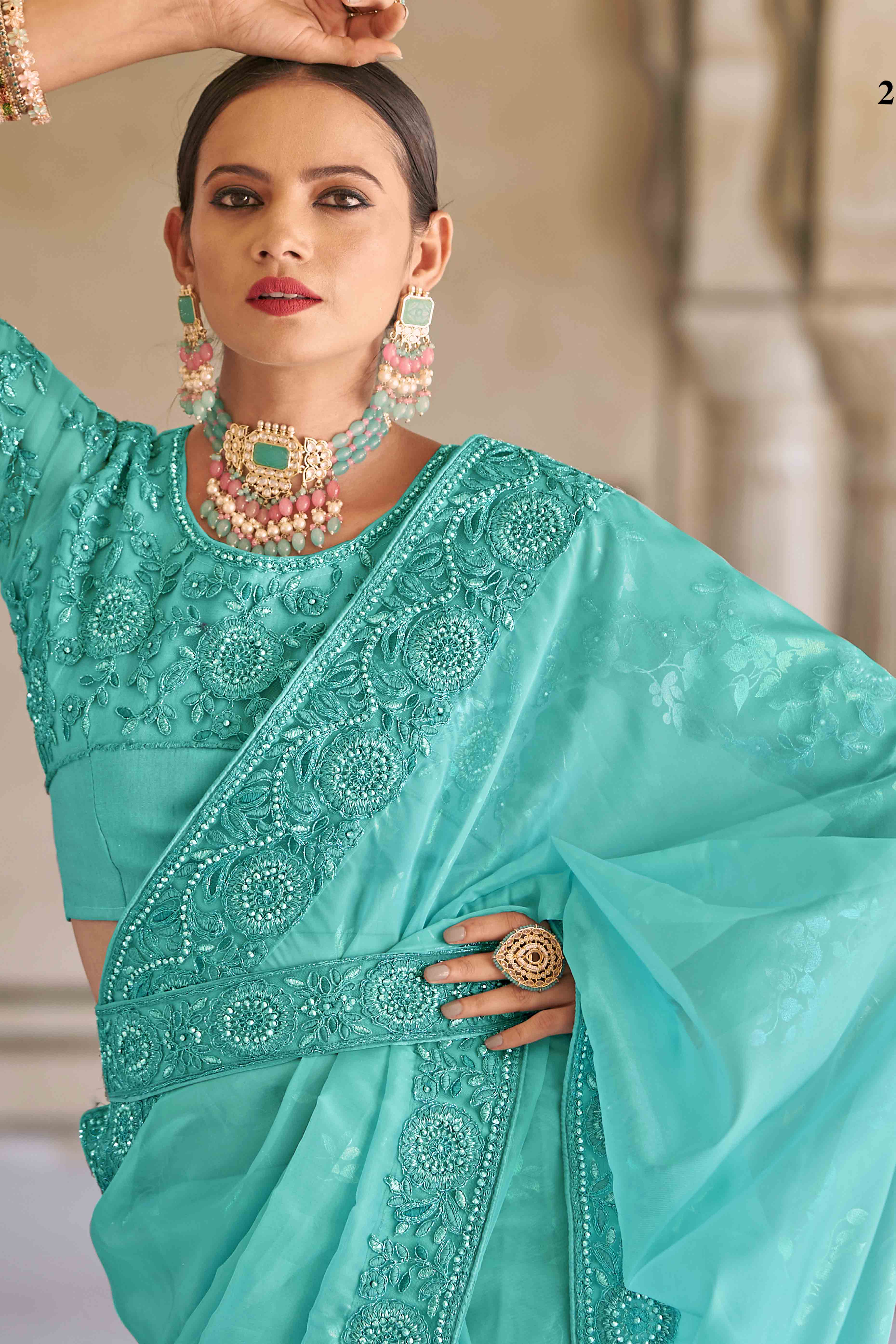 Turquoise Sequins Embroidered Georgette Saree