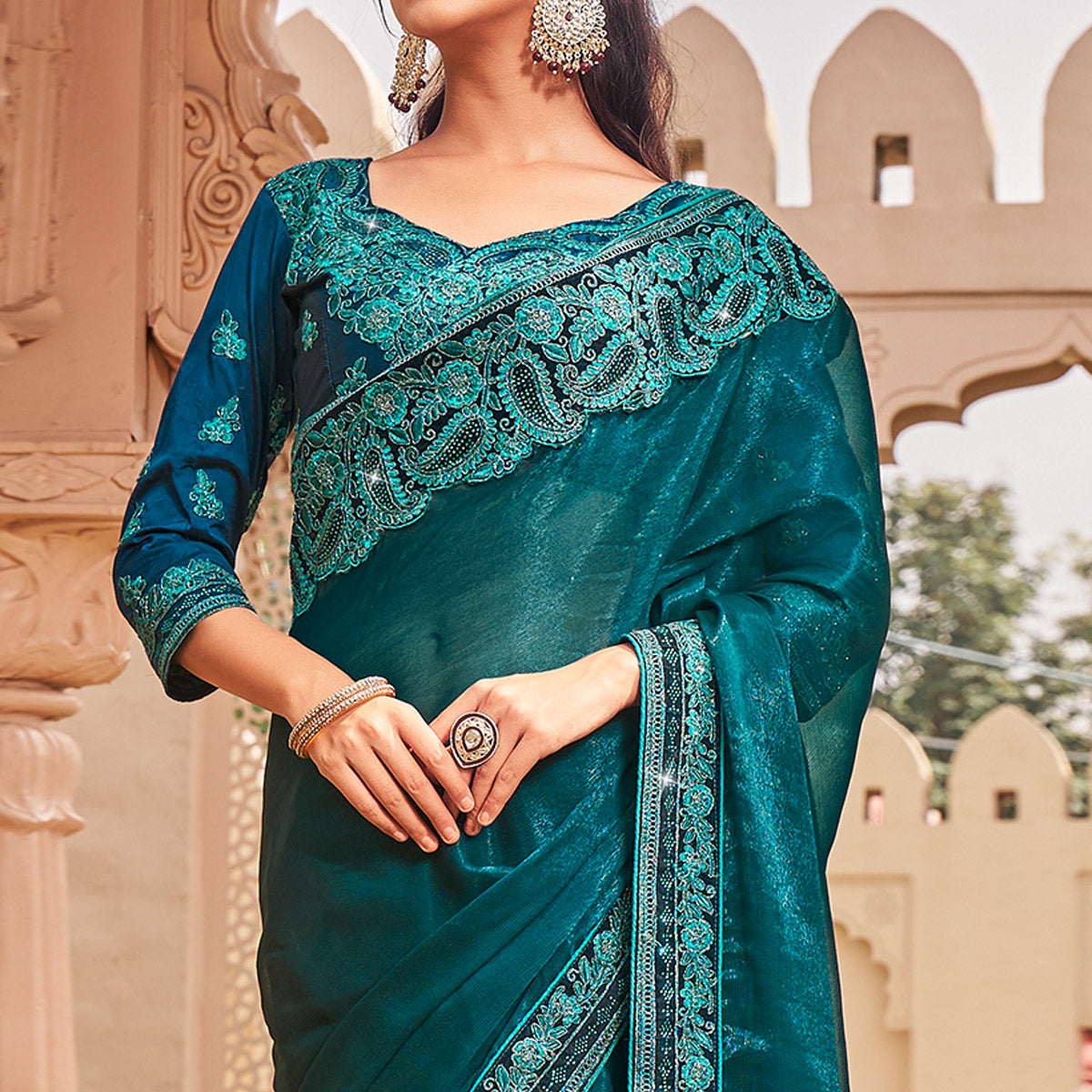 Teal Solid With Embroidered Border Chiffon Saree
