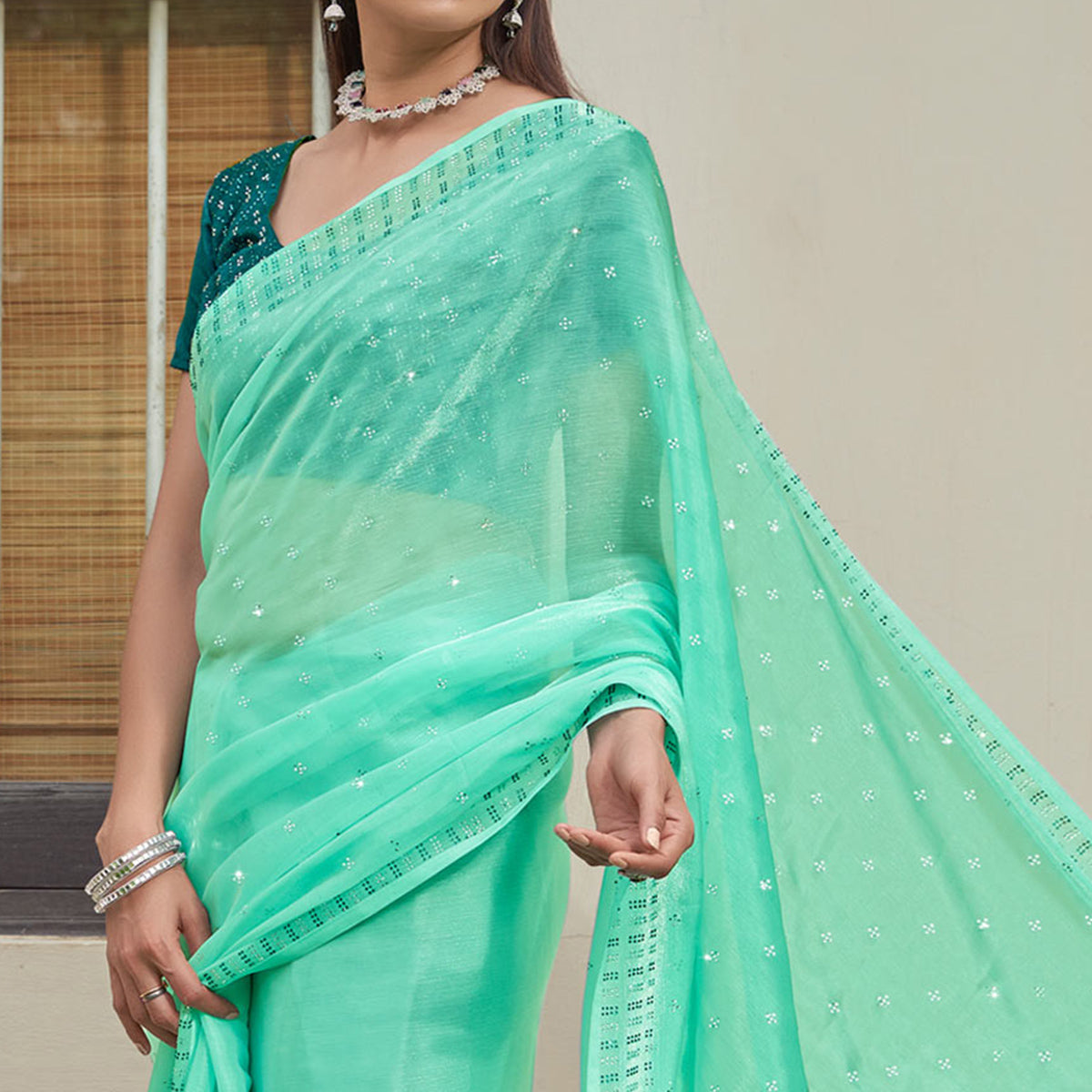 Turquoise Embroidered Tissue Saree