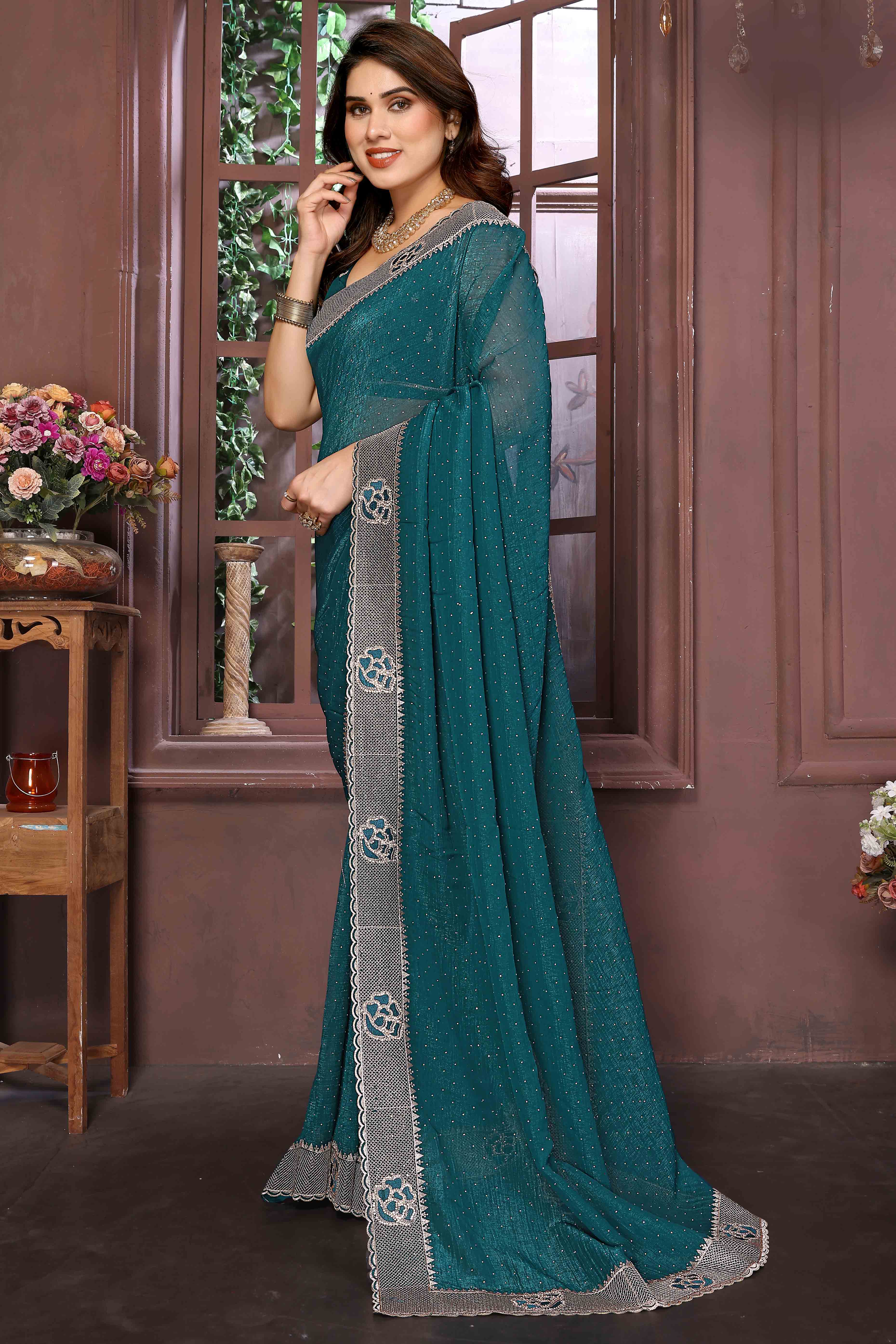 Teal Crunchy Saree Adorned With Swarovski Sparkle & Floral Zari Elegance