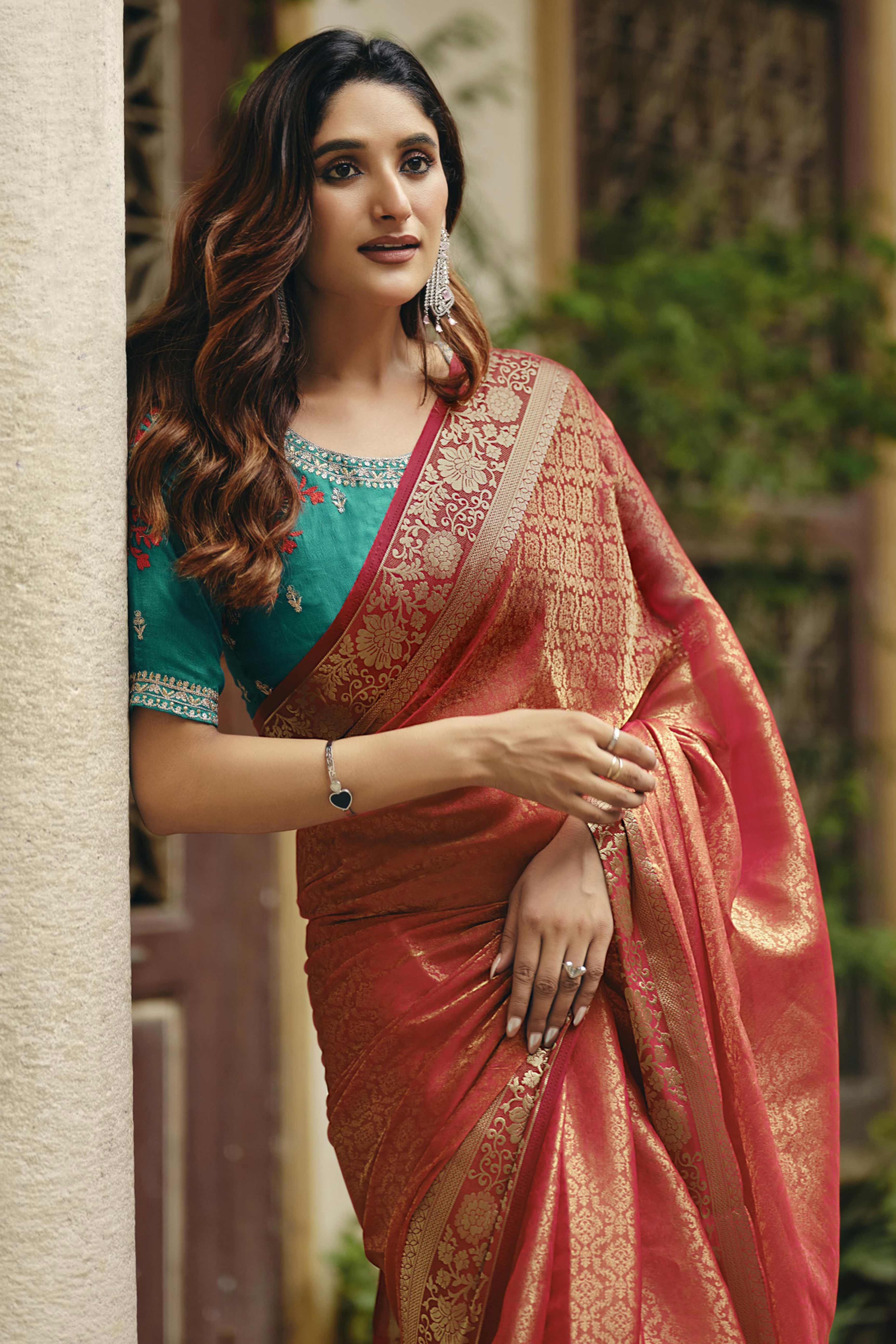 Elegant Orange Partywear Nylon Silk Saree with Stone & Weaving Details