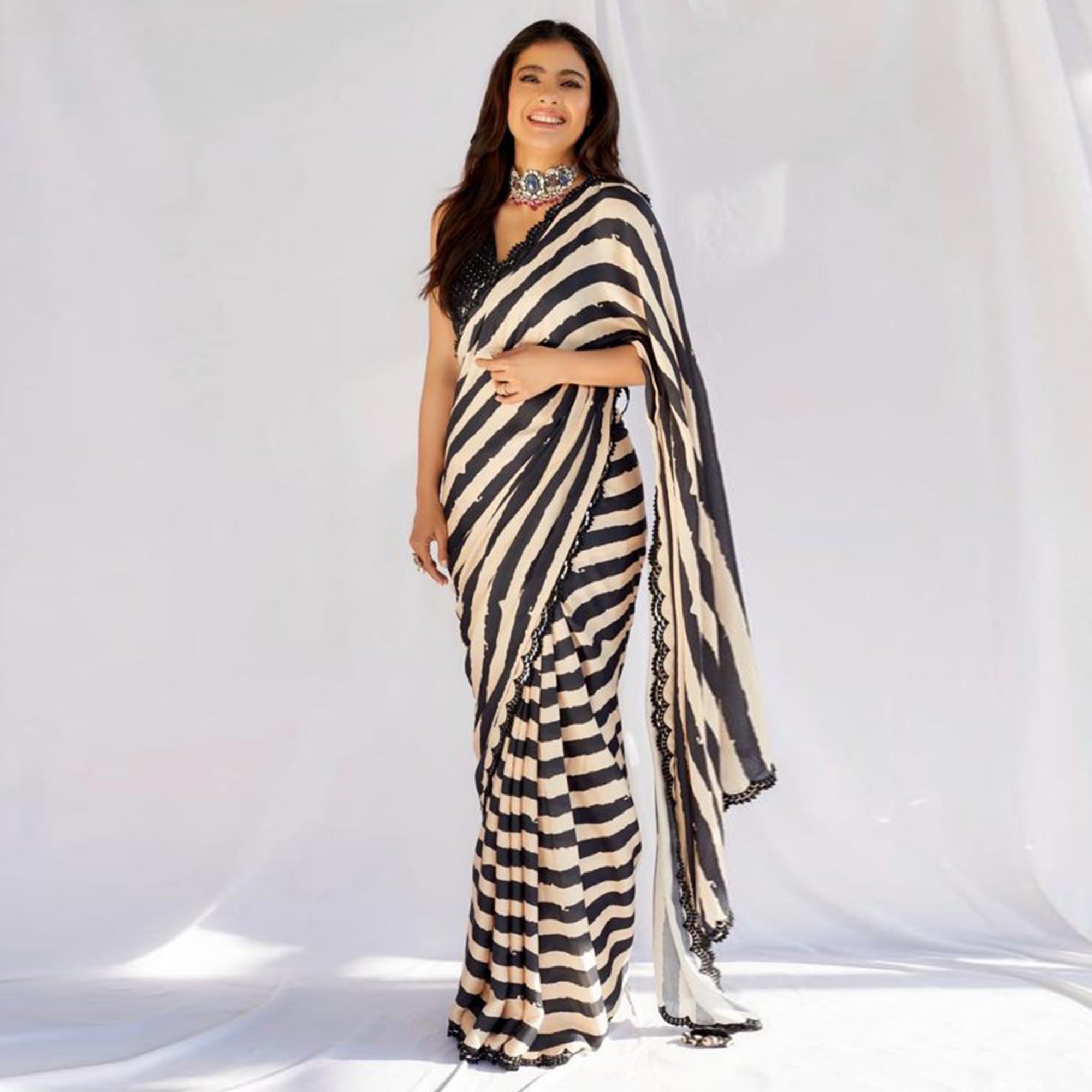 Black & White Printed Georgette Saree With Sequins Border