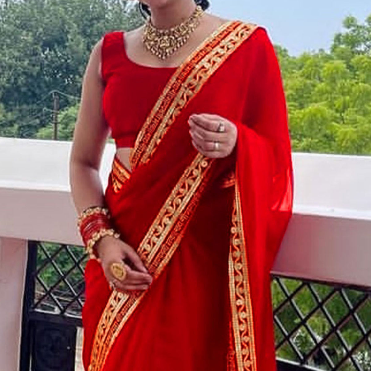 Red Solid With Embroidered Border Georgette Saree