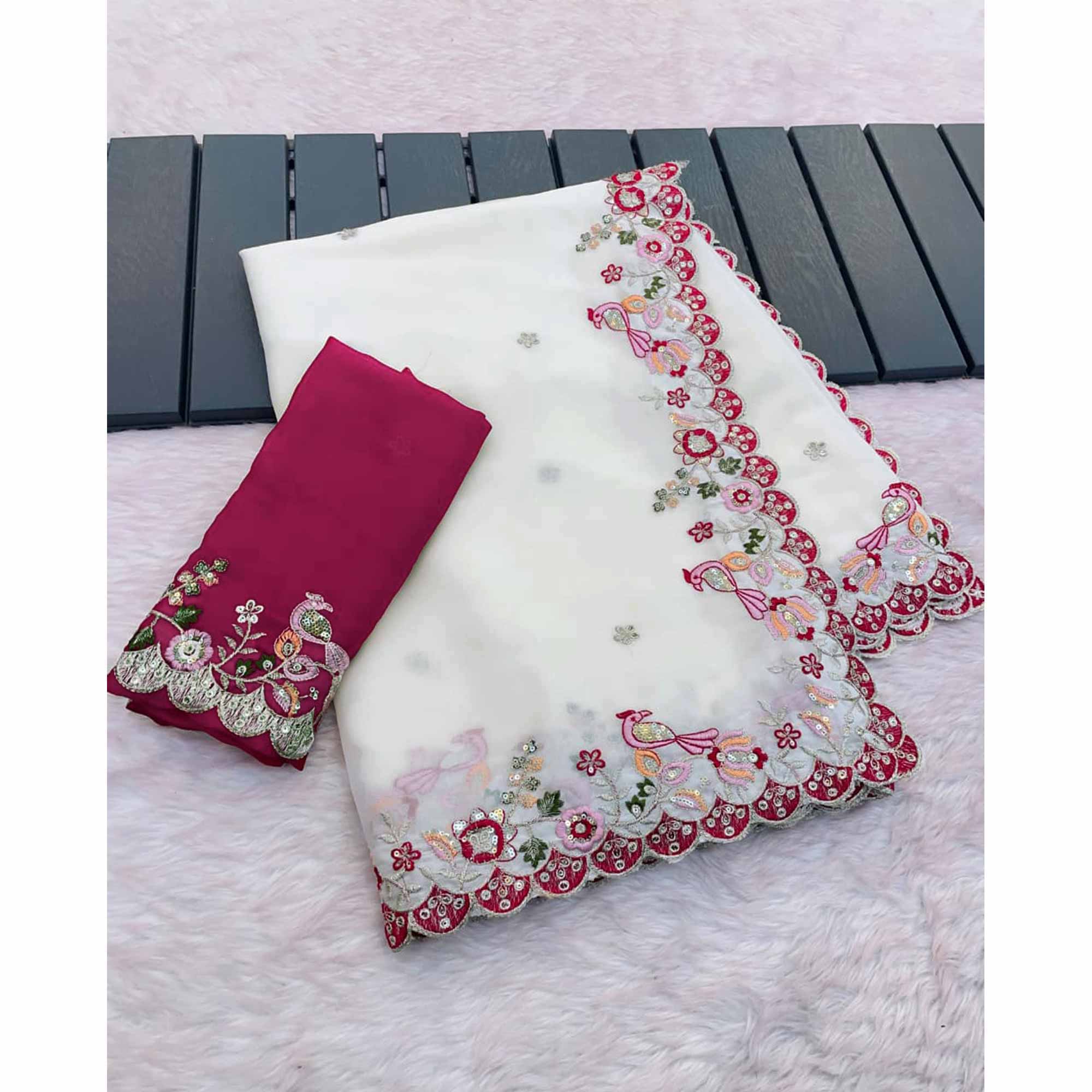 Stylish Off White Georgette Partywear Saree with Beautifully Embroidered Border Detailing