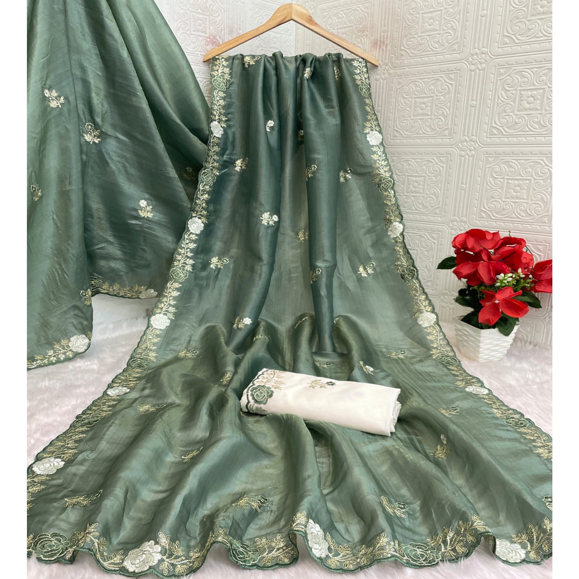 Green Lightweight Georgette Crush Saree Adorned with Delicate Floral Embroidery