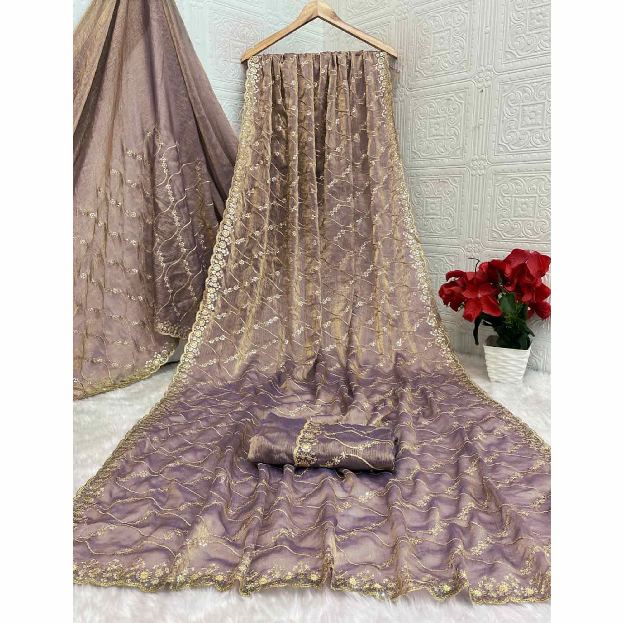 Lavender Partywear Organza Chiffon Silk Saree Highlighted with Fine Sequins Detailing