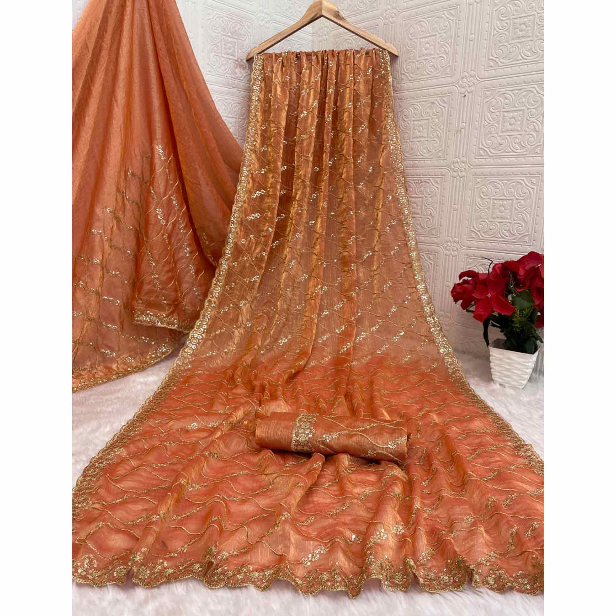 Orange Partywear Organza Chiffon Silk Saree Highlighted with Fine Sequins Detailing
