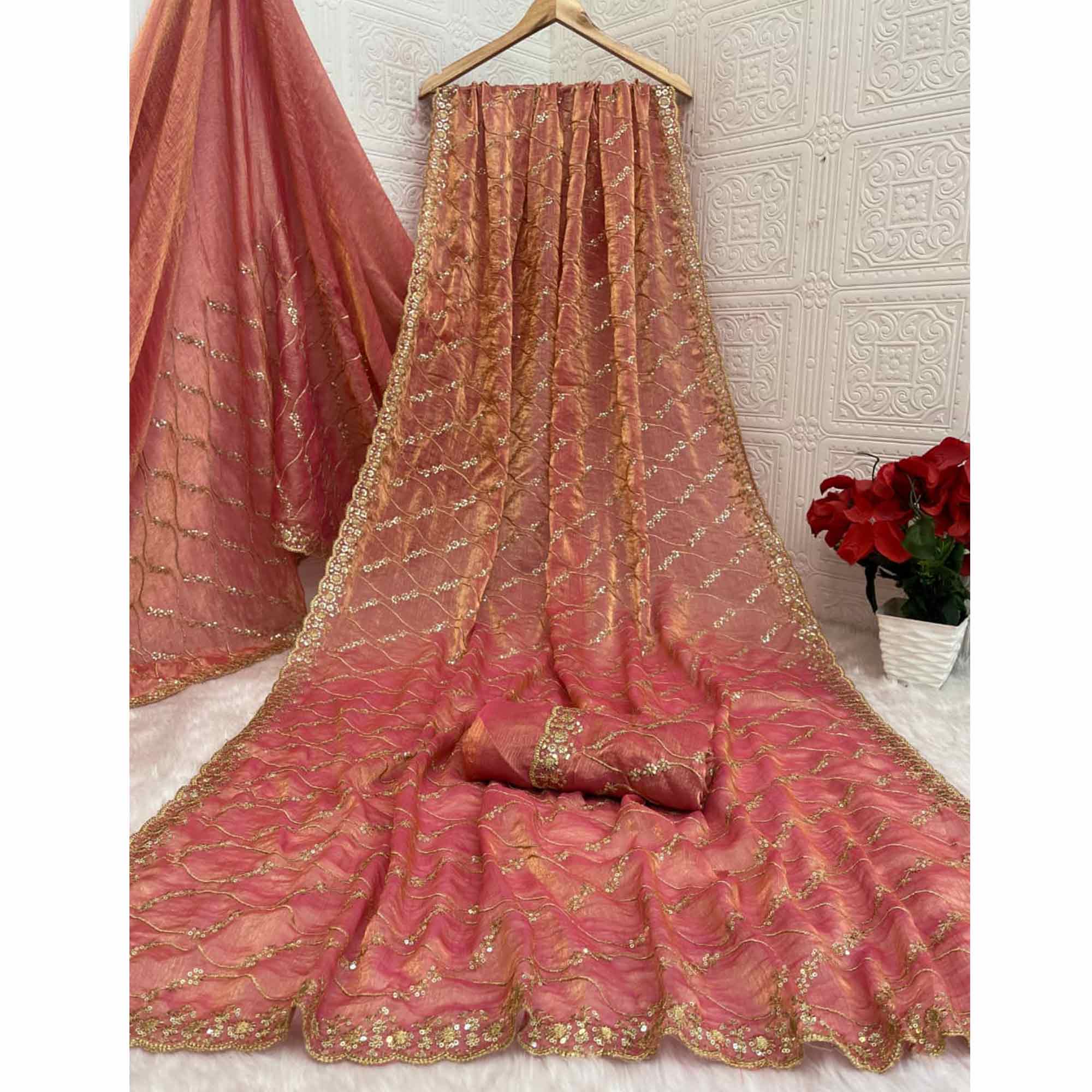 Peach Partywear Organza Chiffon Silk Saree Highlighted with Fine Sequins Detailing