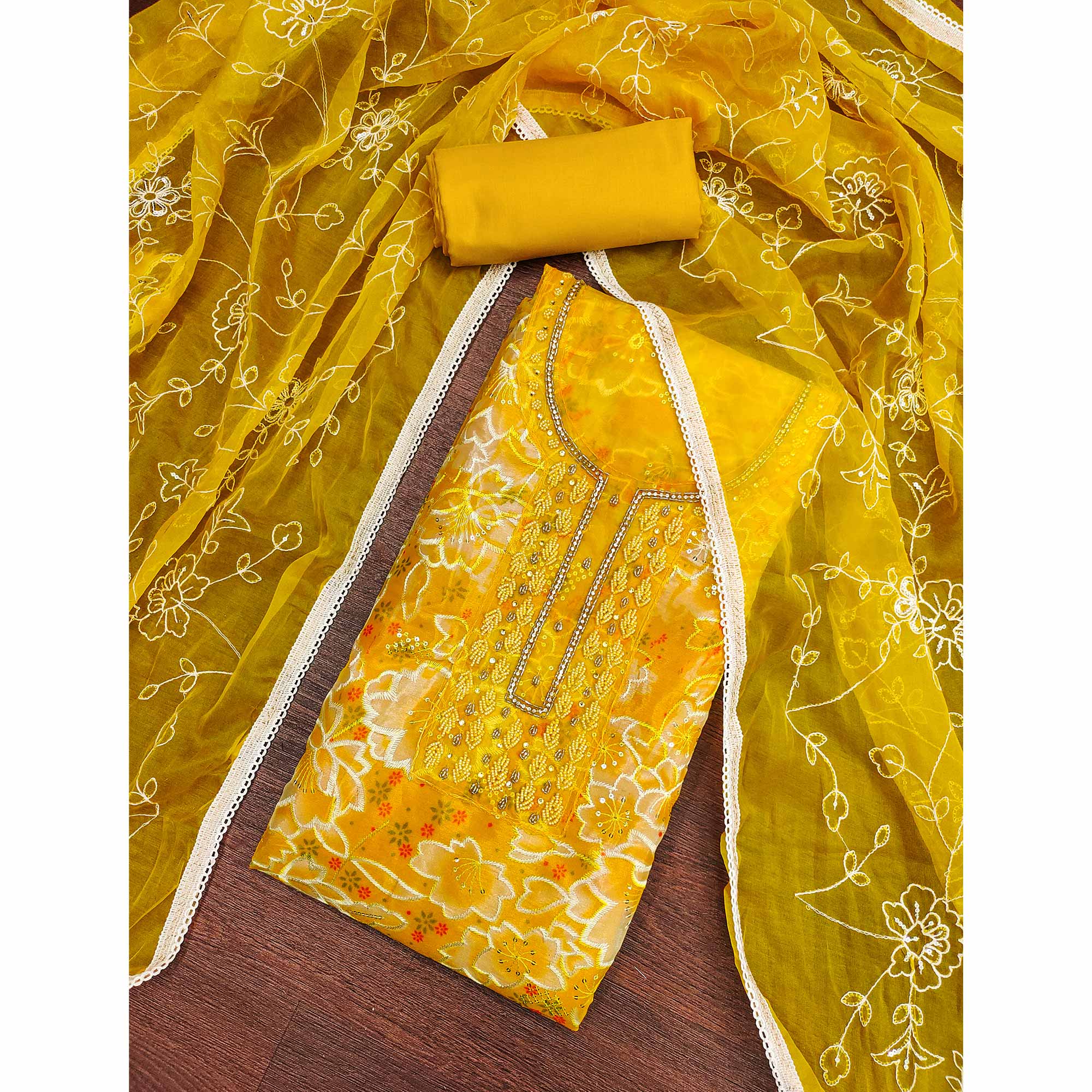 Yellow Delicate Floral Sequins & Hand Embellishments On Flowing Organza Dress Material