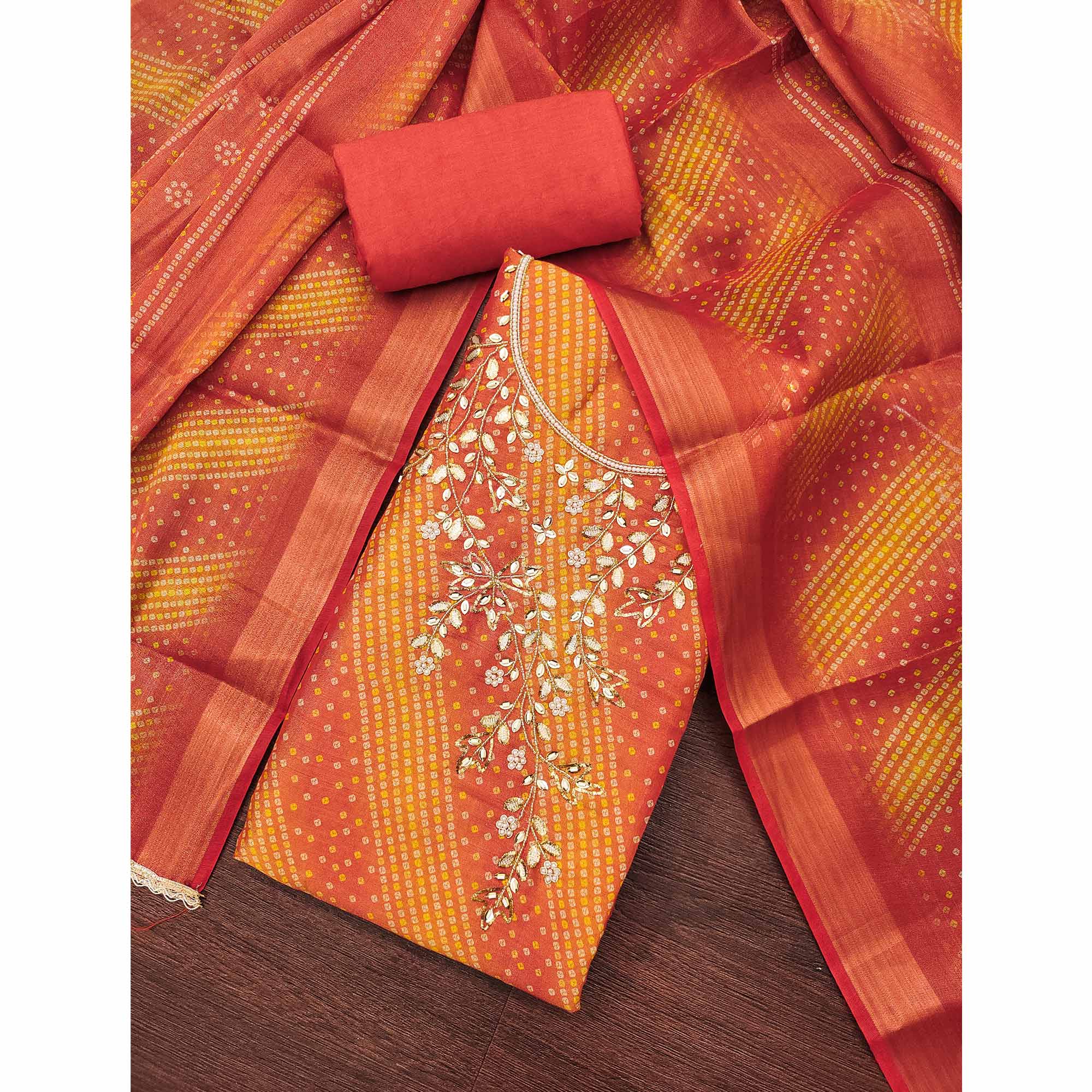 Bandhani Printed Orange Cotton Silk Dress Material with Hand Embellishment