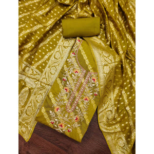 Green Shimmer Cotton Silk Suit Material Featuring Zari Weaving and Artistic Embroidered Detailing
