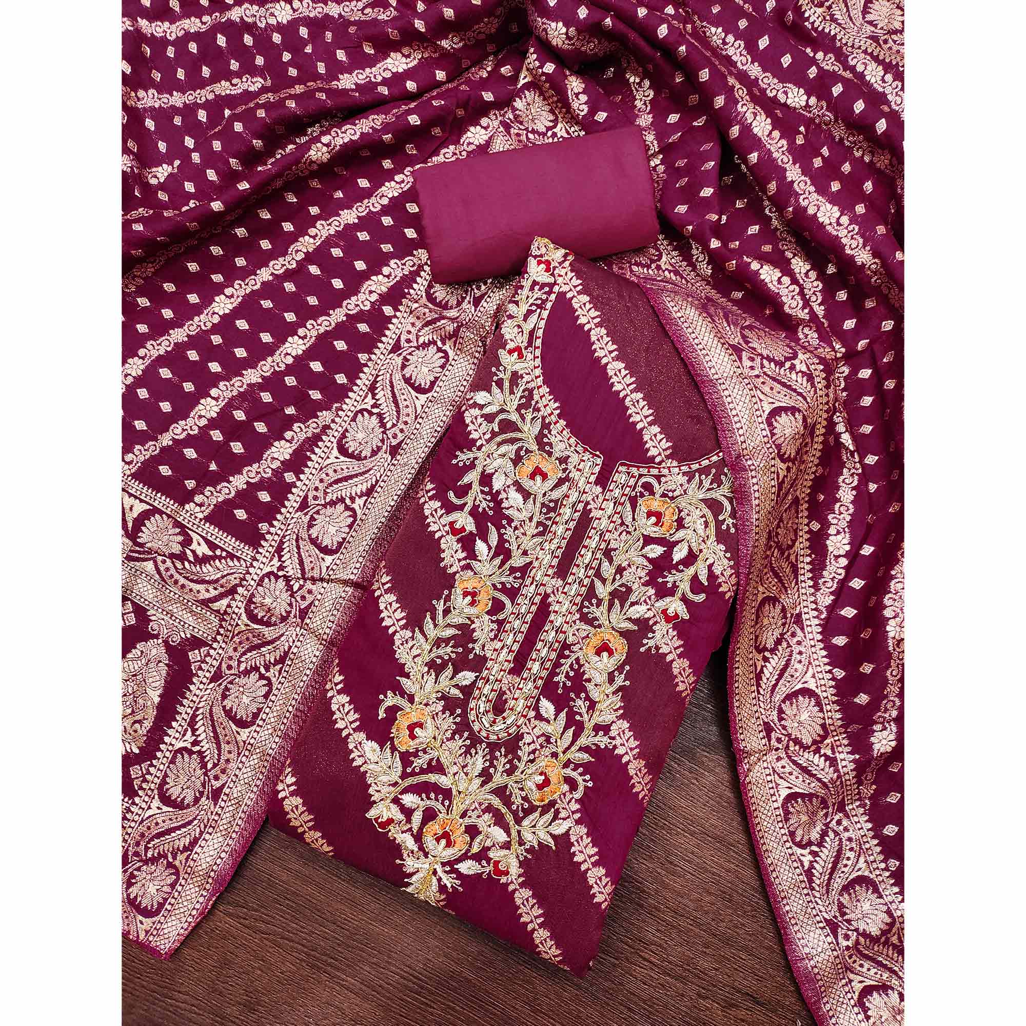 Magenta Shimmer Cotton Silk Suit Material Featuring Zari Weaving and Artistic Embroidered Detailing