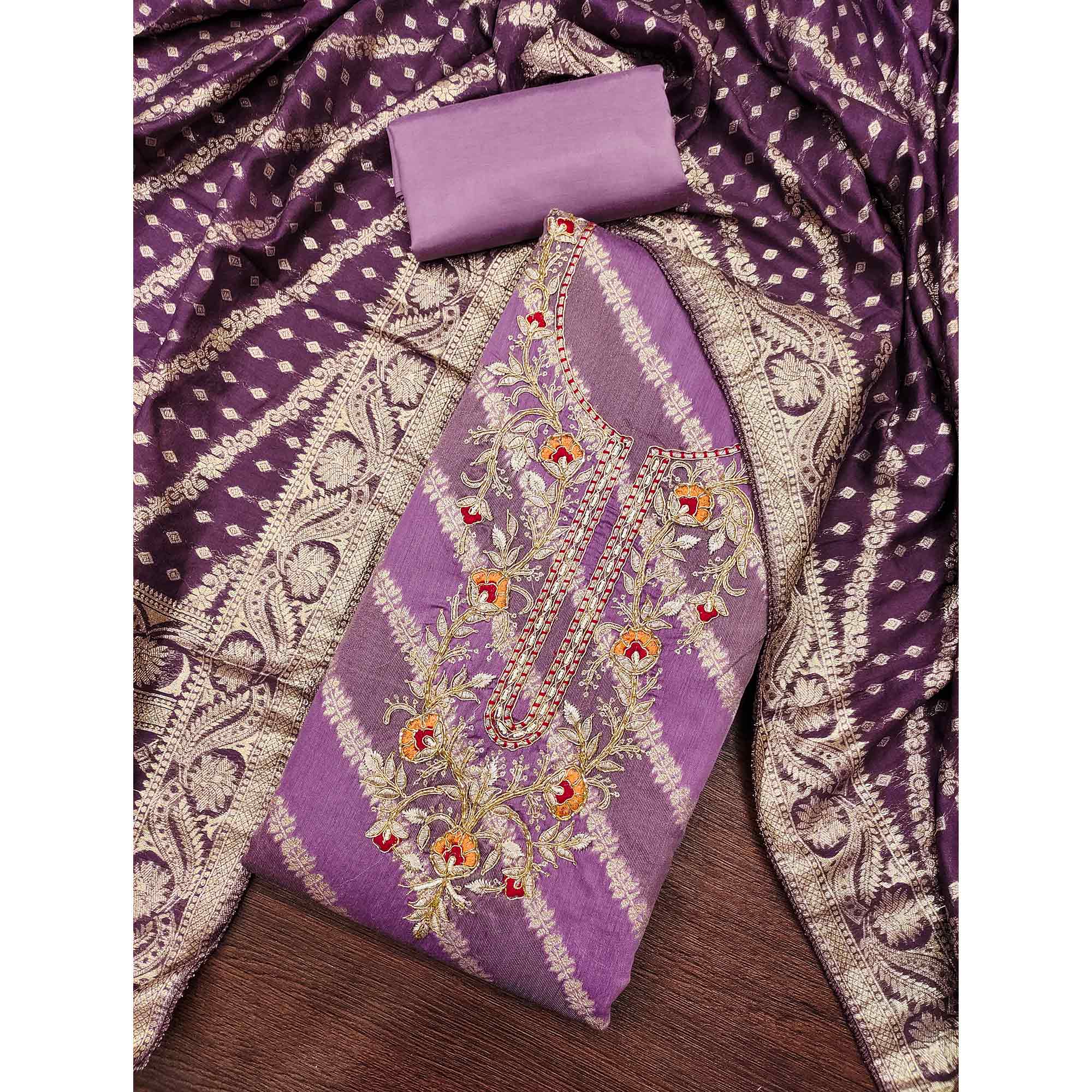 Purple Shimmer Cotton Silk Suit Material Featuring Zari Weaving and Artistic Embroidered Detailing