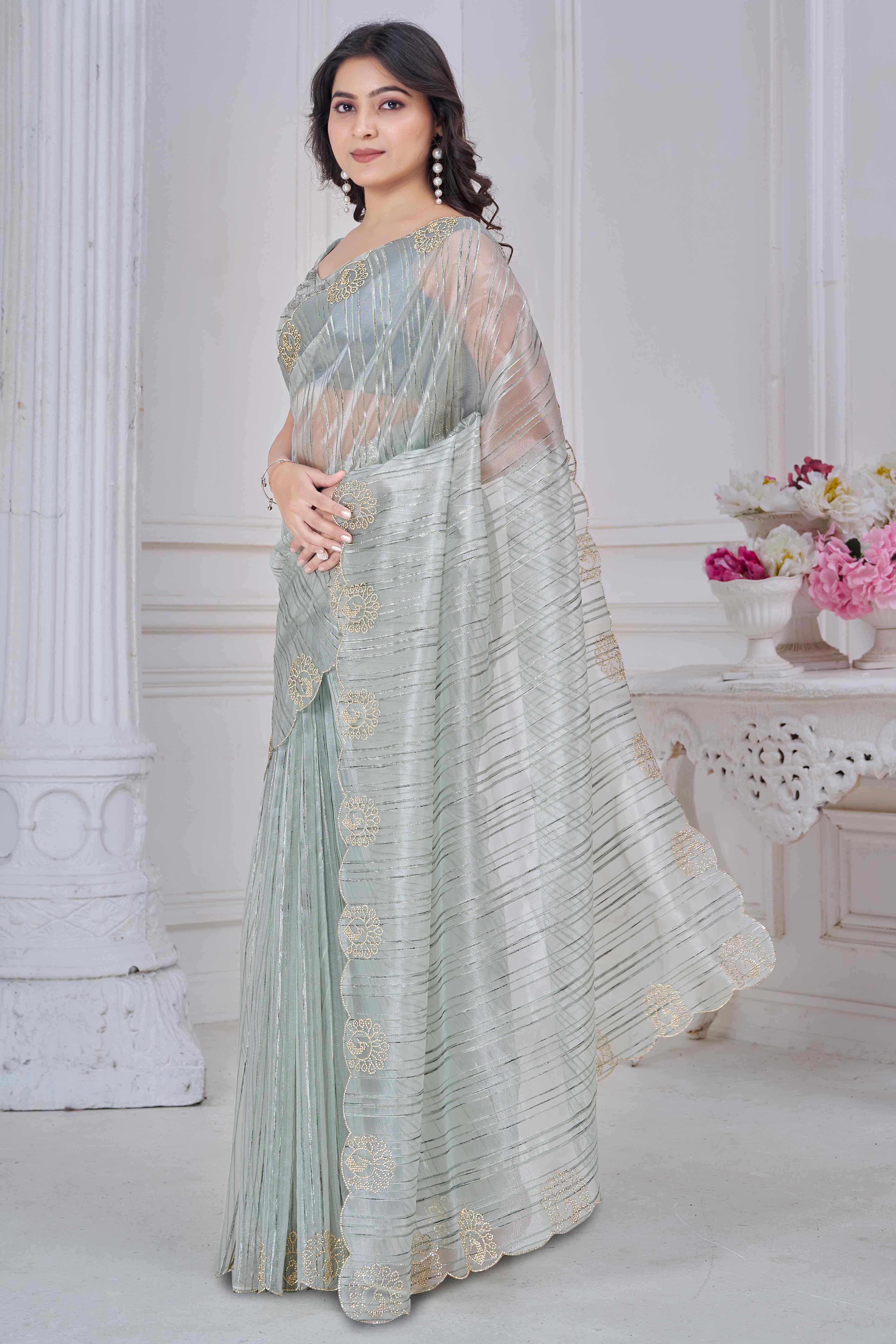 Green Cotton Blend Saree with Modern Stripes and Delicate Stone Embroidery
