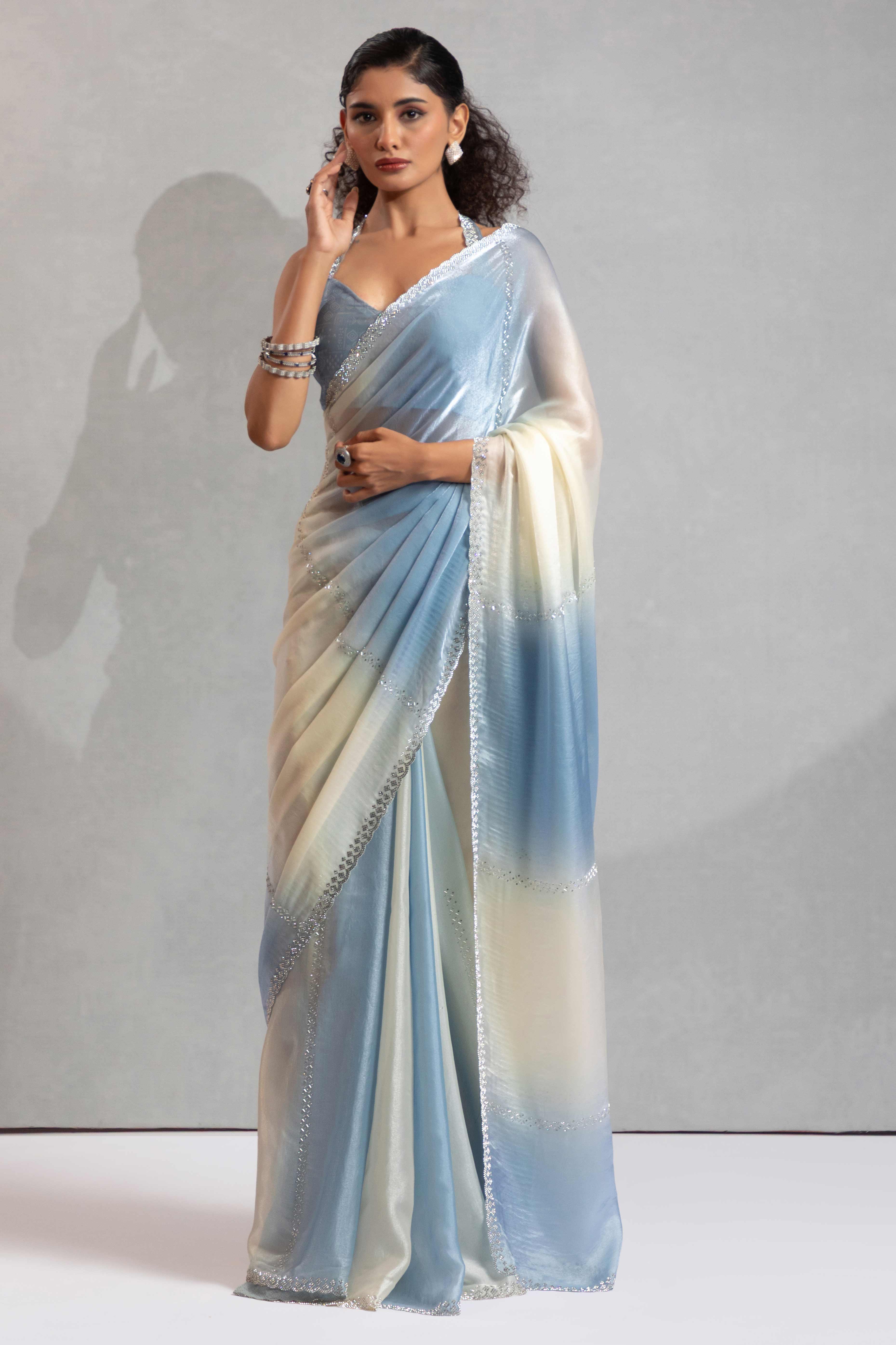 Blue & Off White Satin Silk Saree Decorated With Stone Embellishments