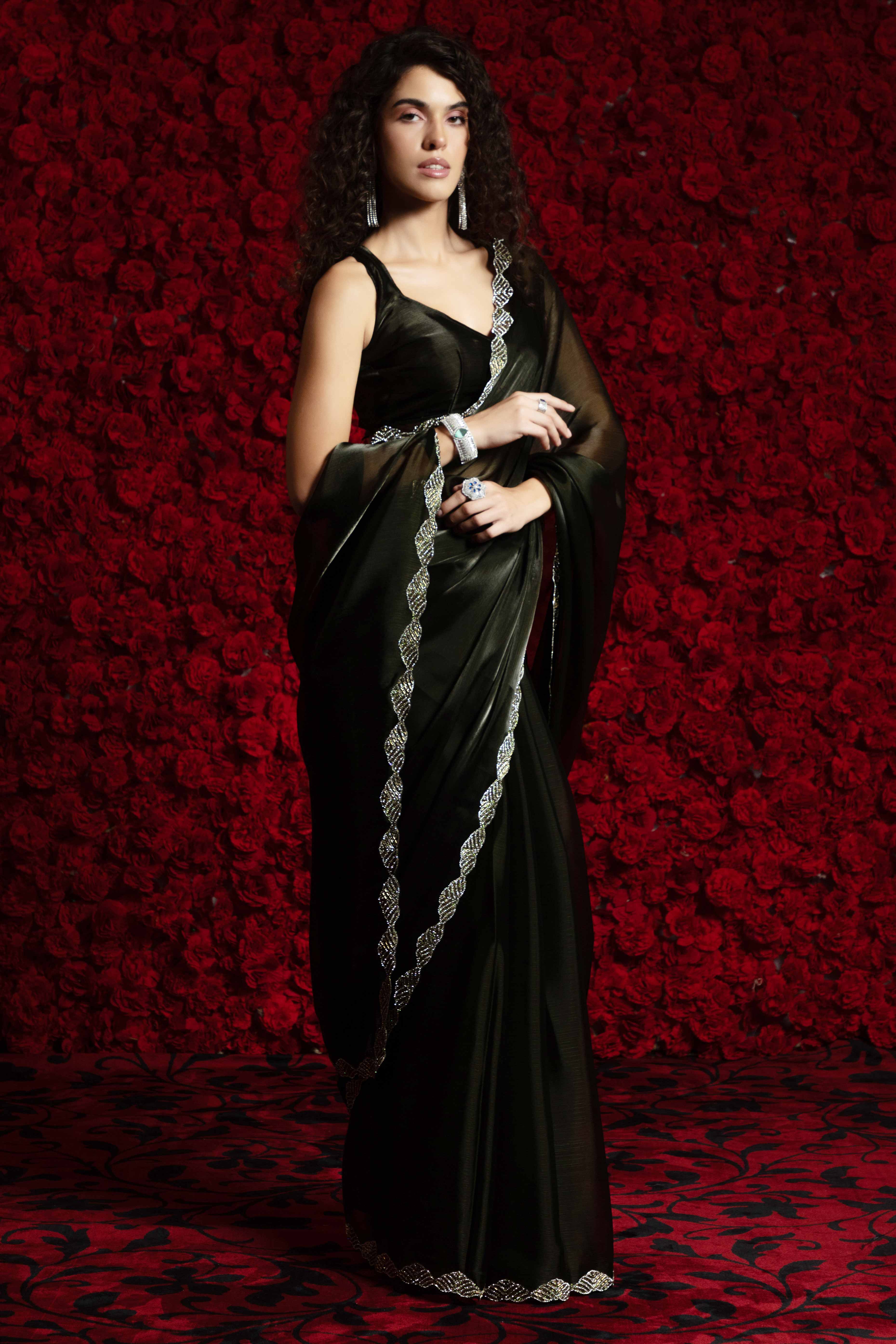 Deep Olive Solid Tissue Chiffon Saree Accentuated With A Sparkling Zarkan Work Border