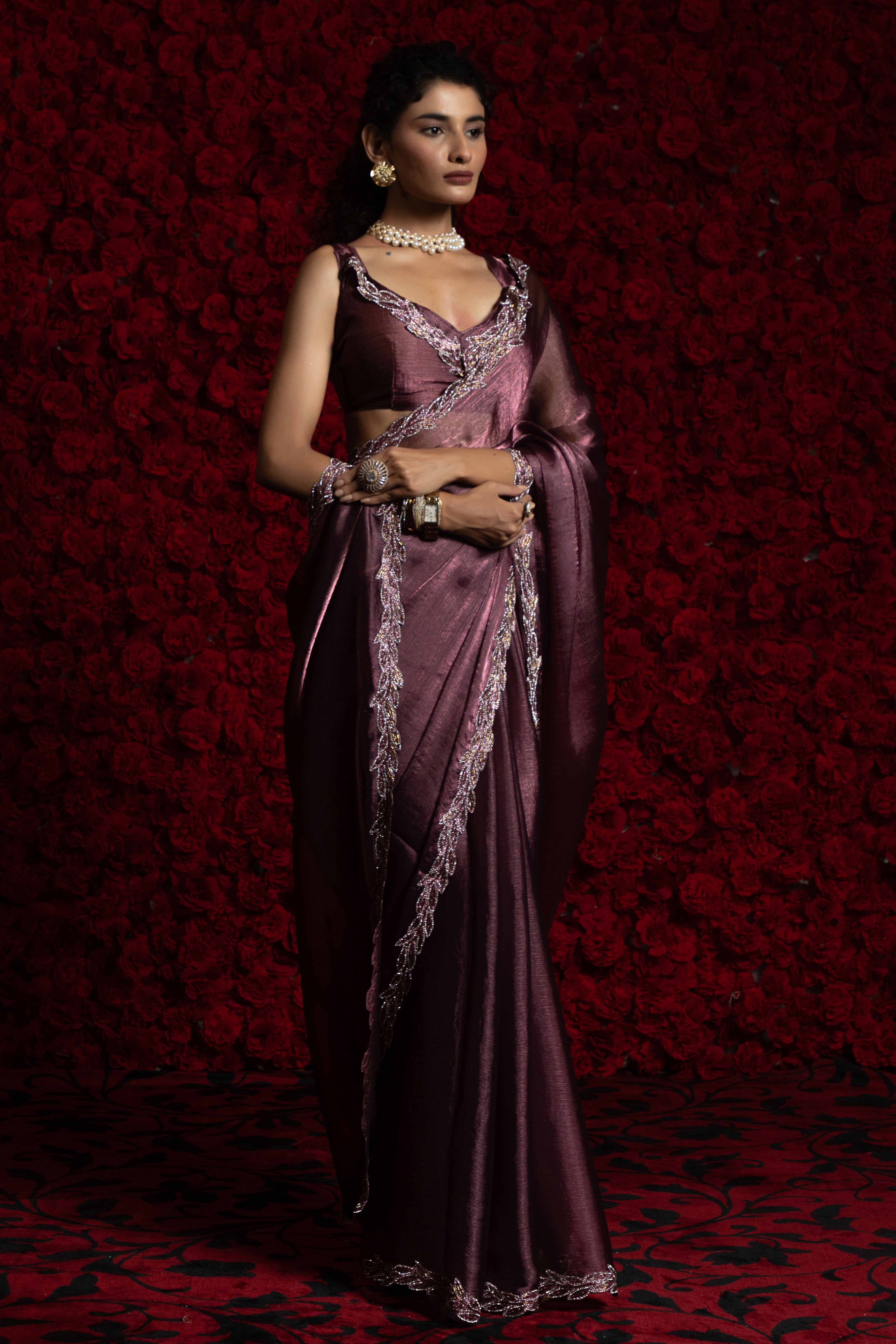 Deep Mauve Solid Tissue Chiffon Saree Accented With Elegant Zarkan Work Border
