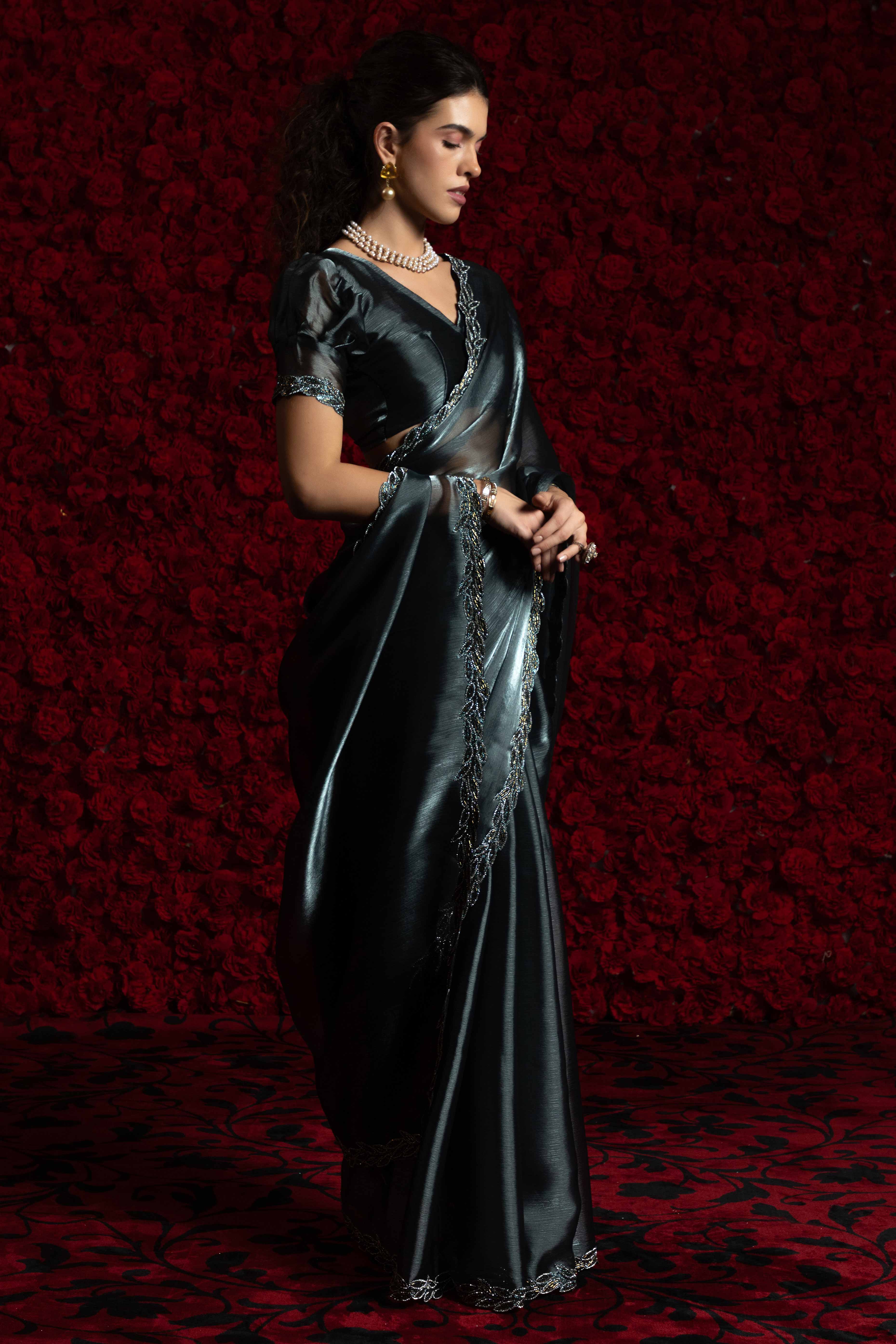 Grey Solid Tissue Chiffon Saree Accented With Elegant Zarkan Work Border