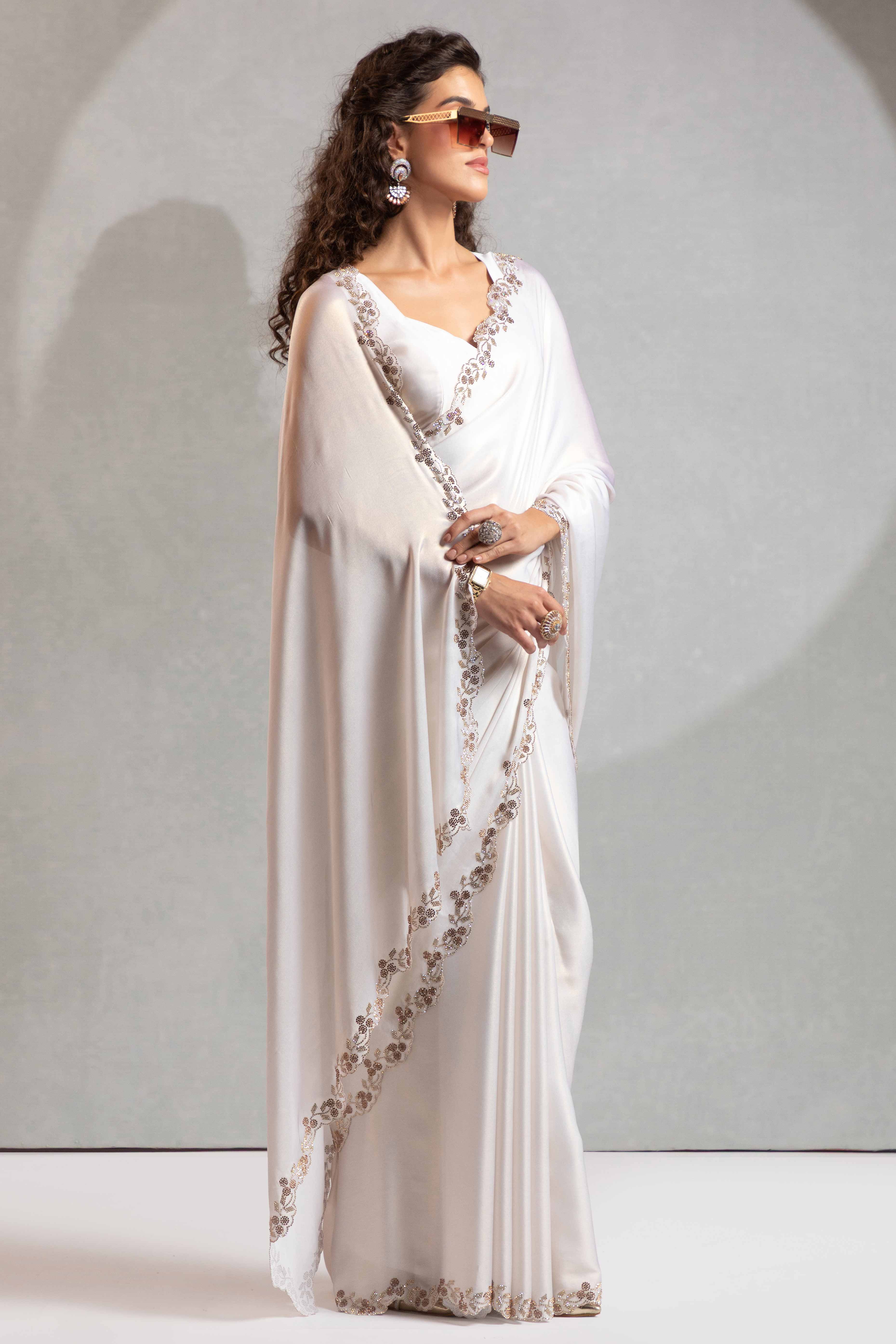 White Satin Georgette Saree Adorned With Subtle Foil Finish & A Sparkling Zarkan Work Border