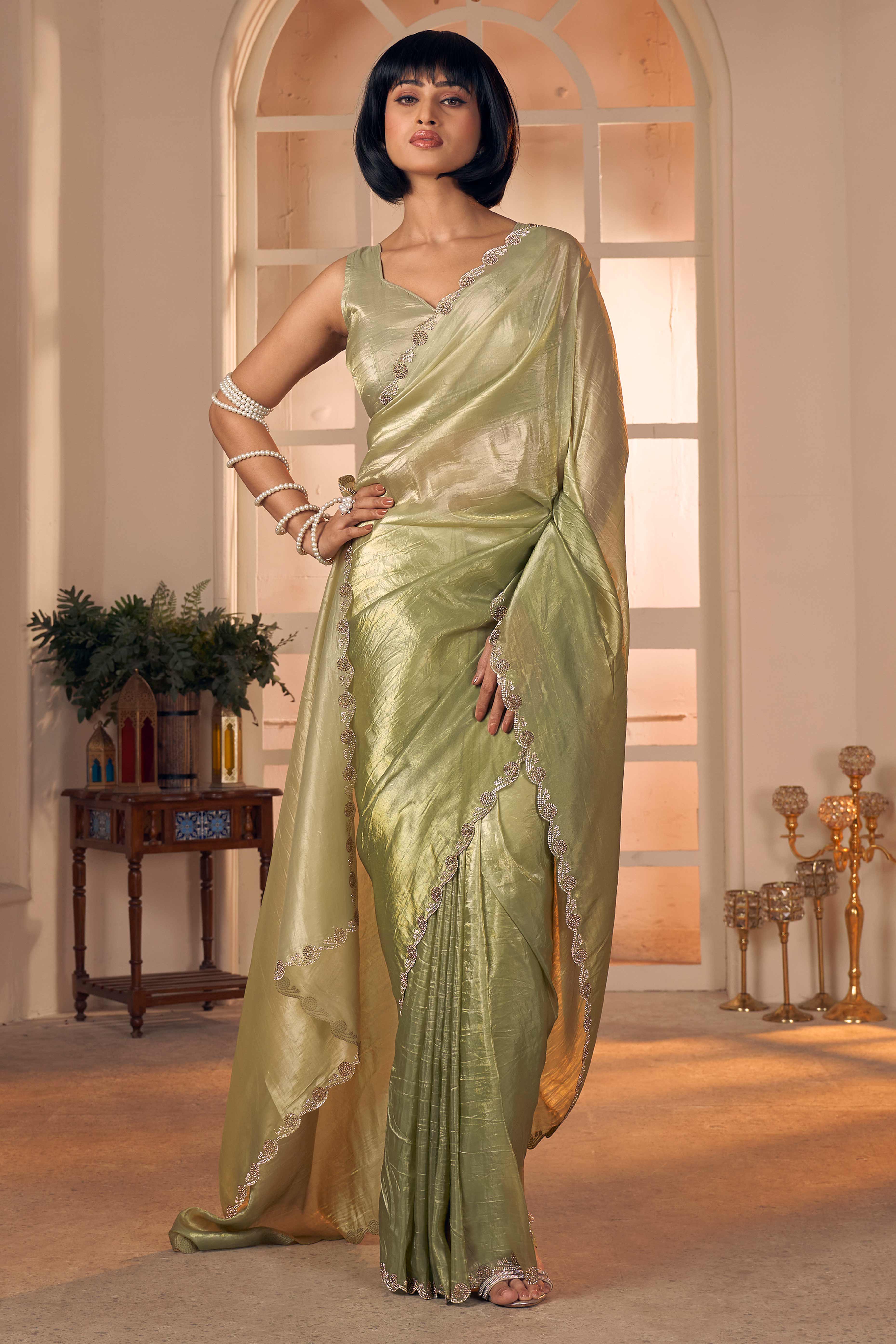 Elegant Olive Pure Silk Saree Enhanced With Premium Zarkan Cutwork Embellishment