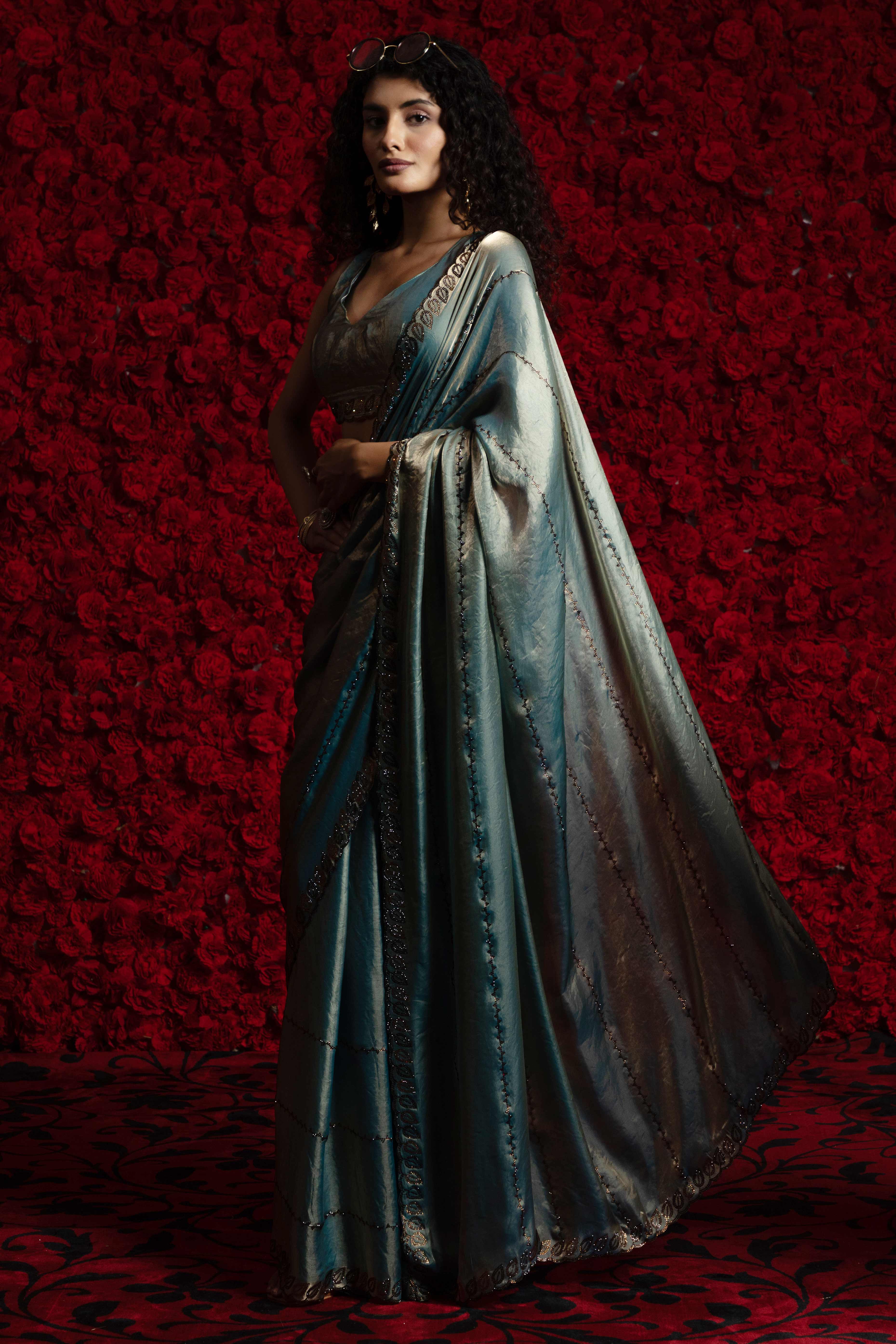 Teal Satin Silk Saree with Dazzling Stone Embellishments for Special Occasions