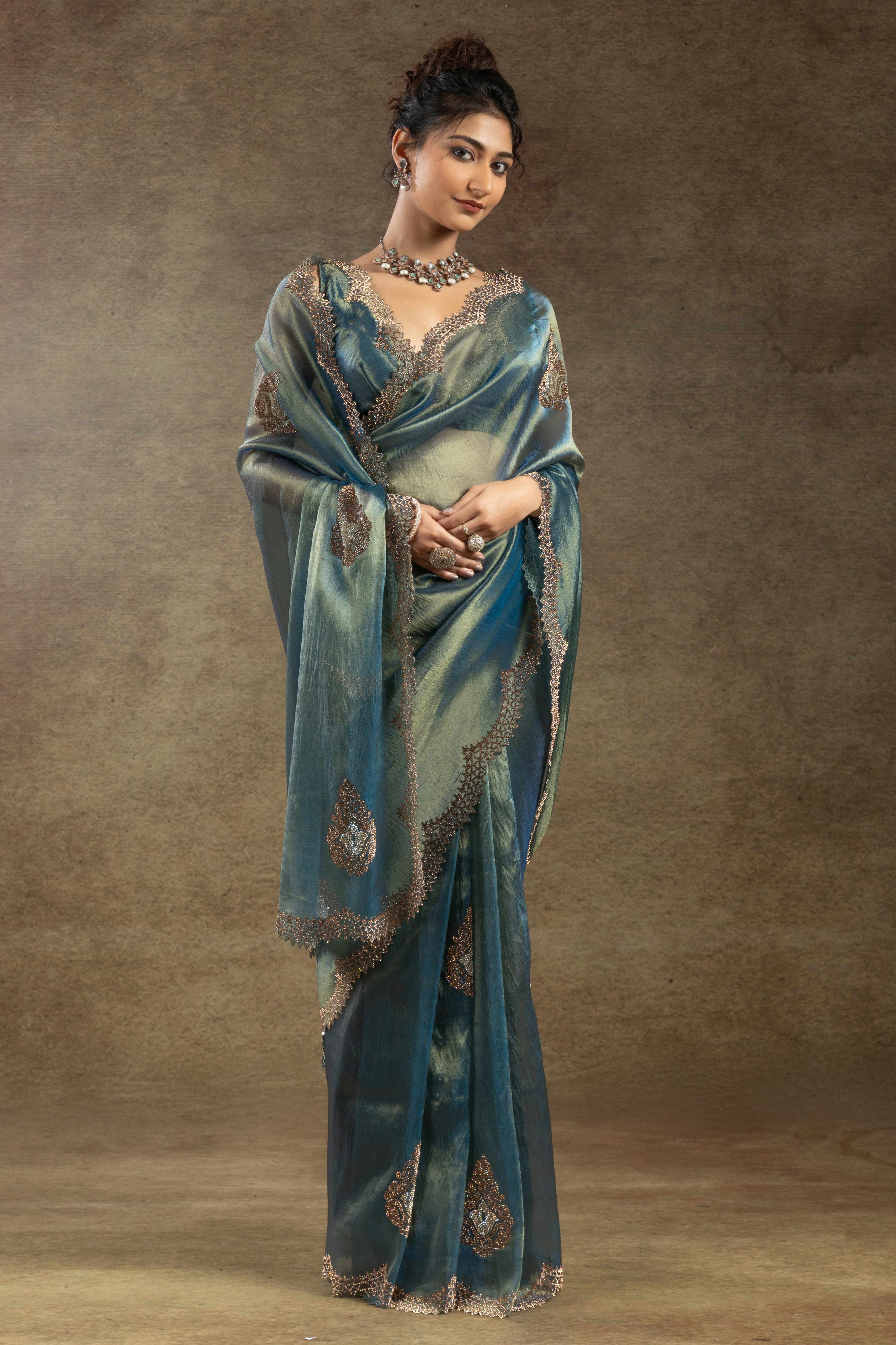 Teal Banarasi Silk Saree with Stone Embellishments Perfect for Party Wear