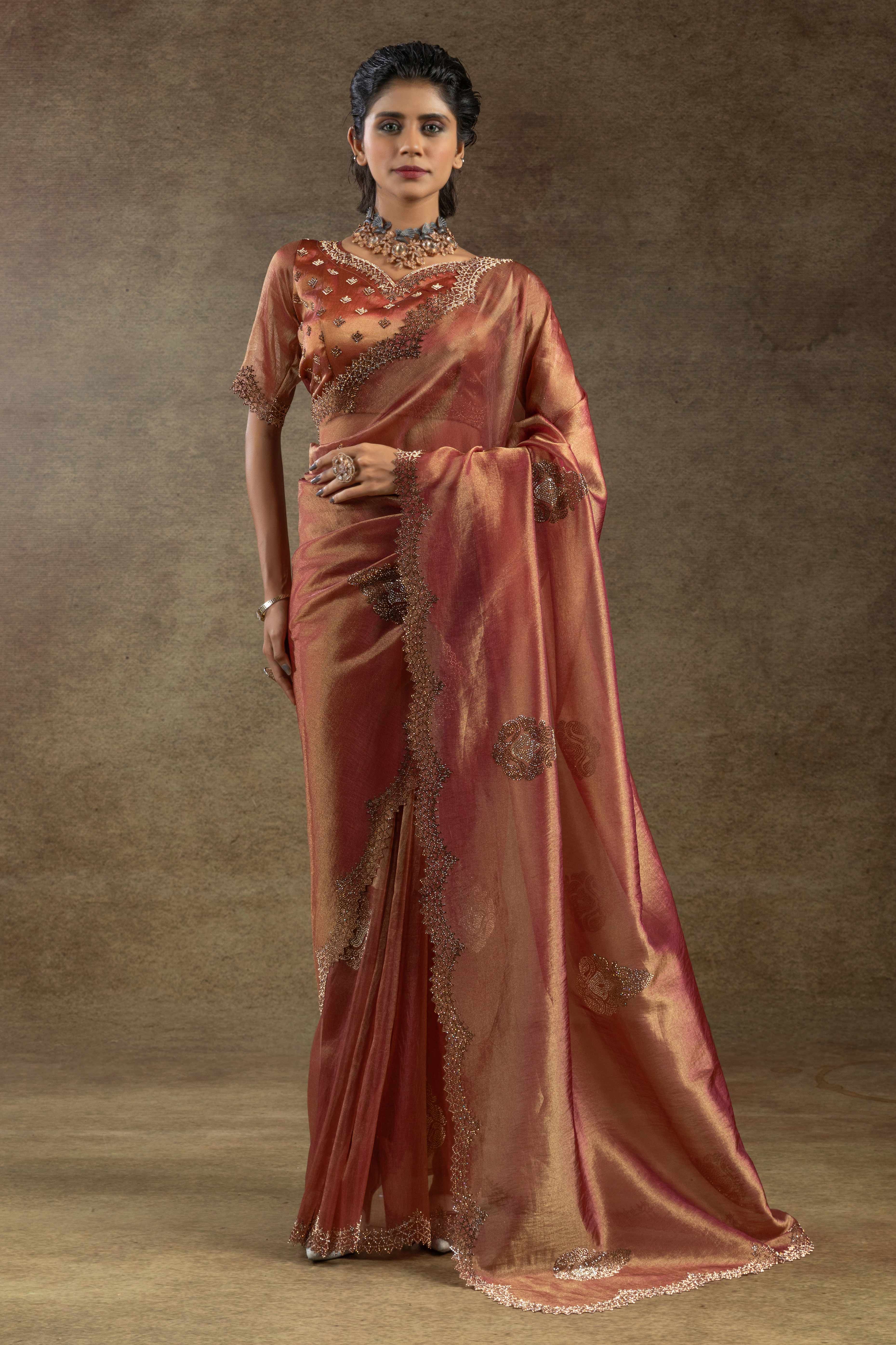 Peach Banarasi Silk Saree with Stone Embellishments Perfect for Party Wear