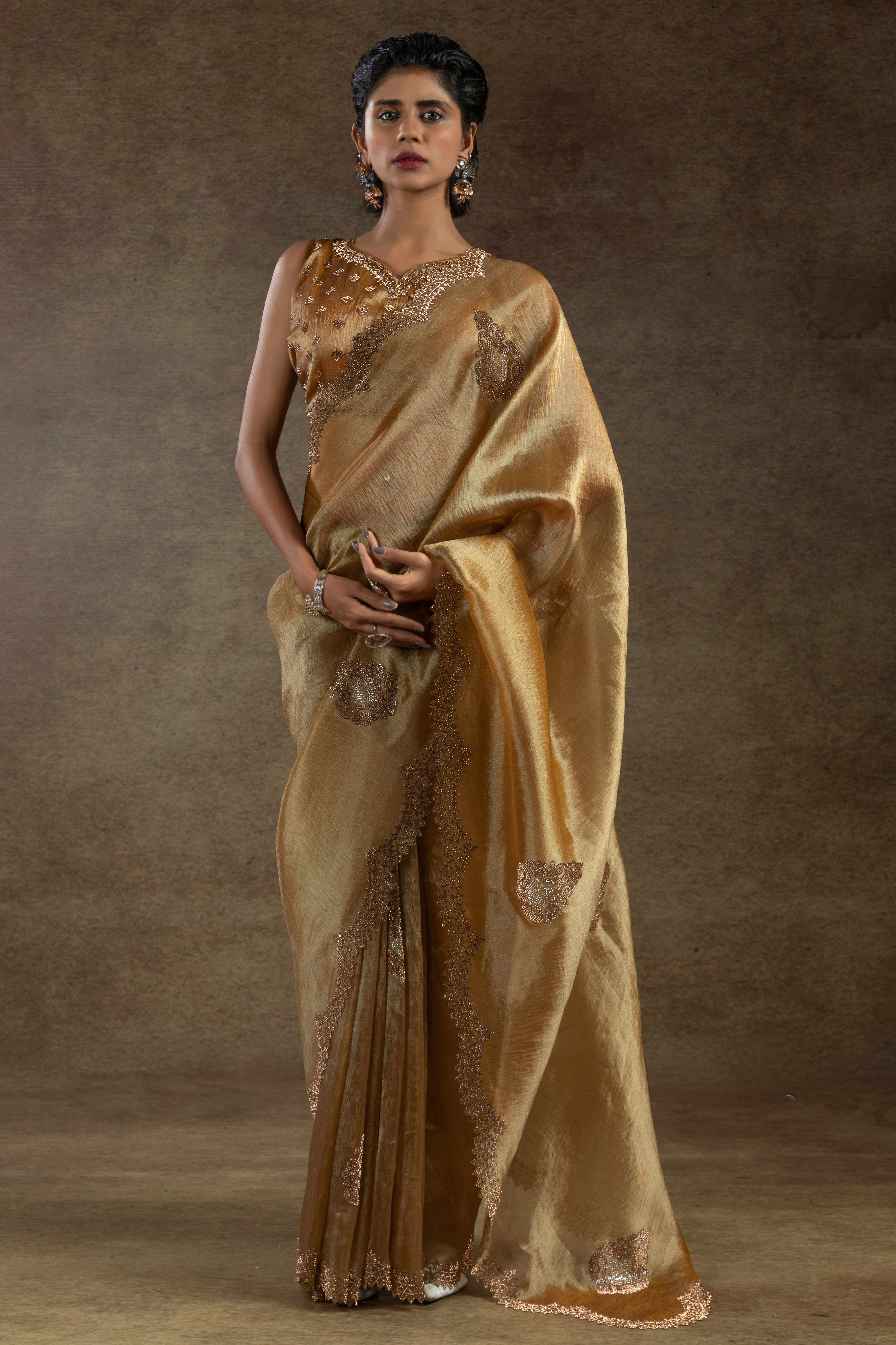 Gold Banarasi Silk Saree with Stone Embellishments Perfect for Party Wear