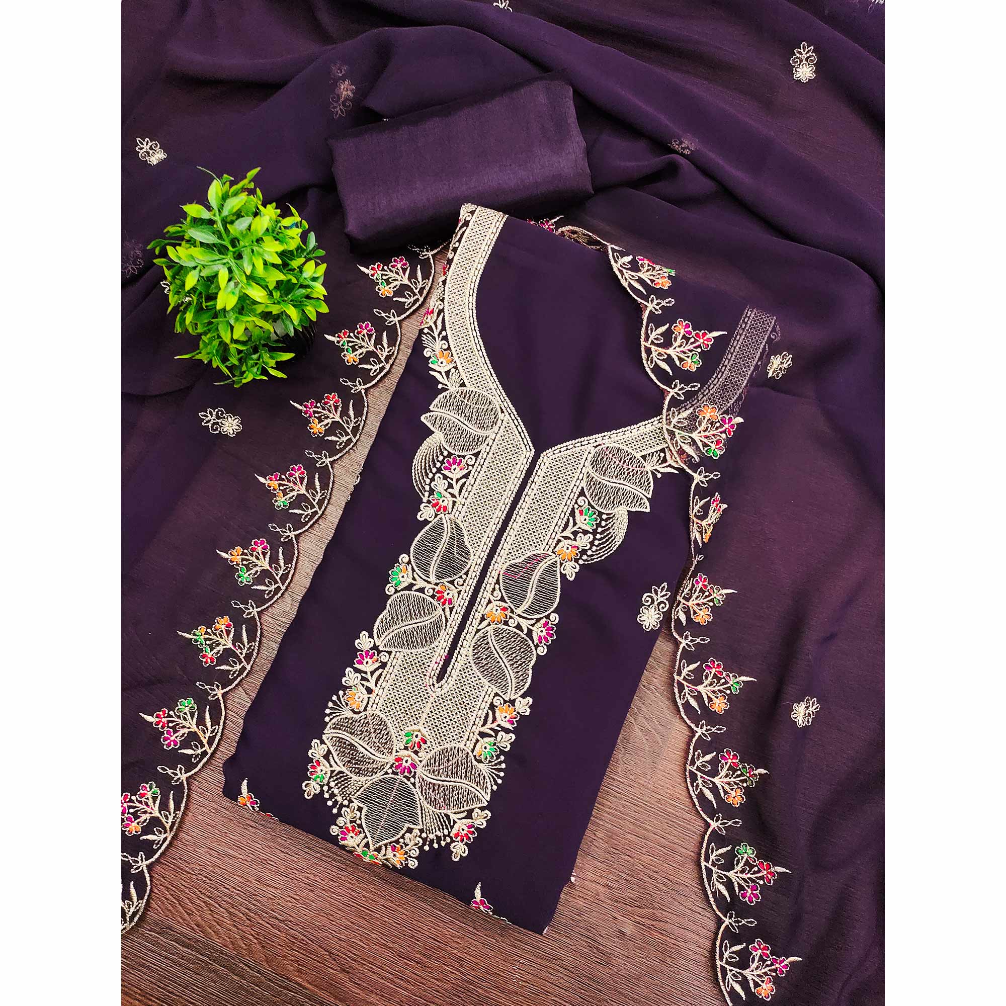 Dark Purple Georgette Dress Material Adorned With Floral Embroidery & Elegant Lace Border