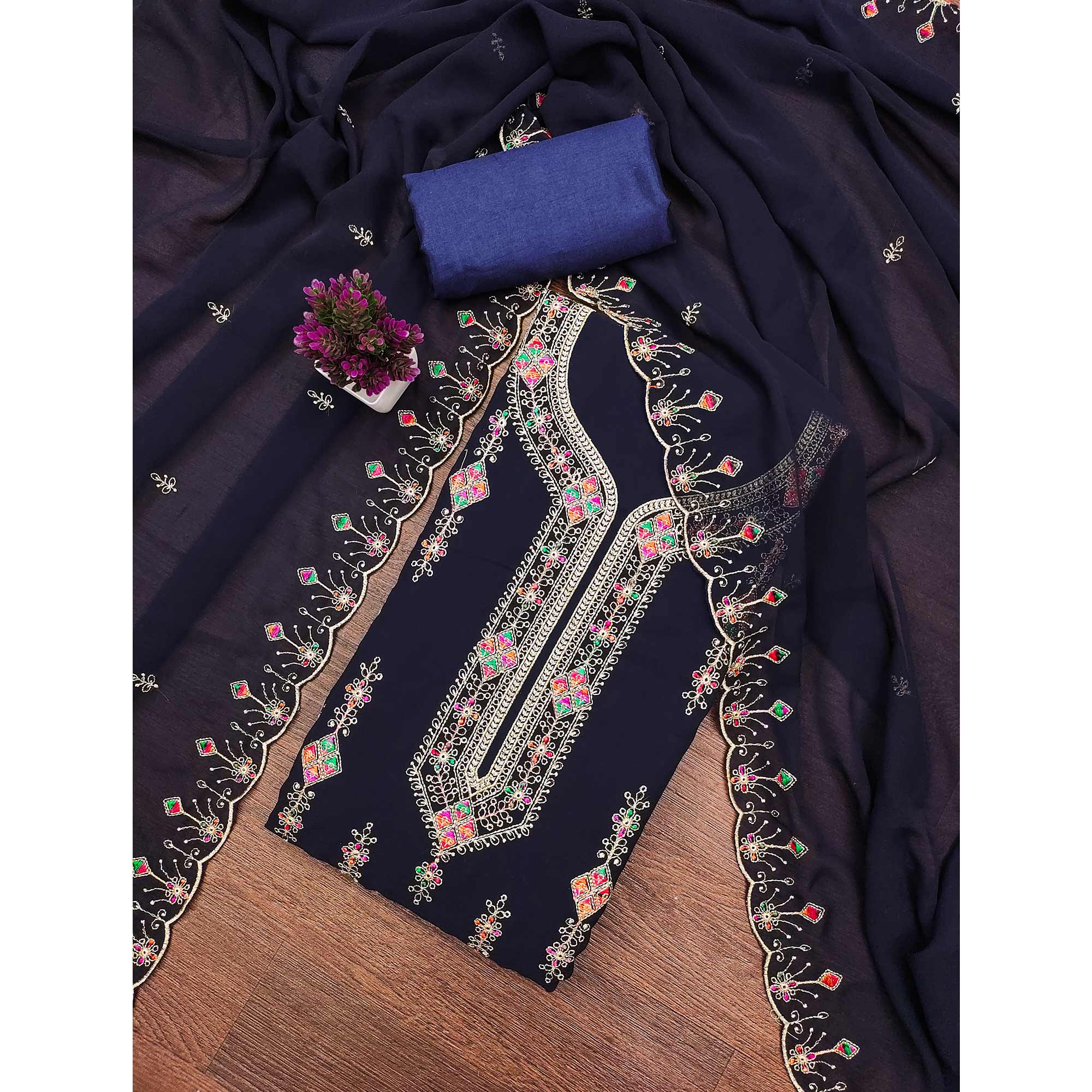 Blue Georgette Dress Material Enhanced With Graceful Floral Embroidery For An Elegant Ethnic Look