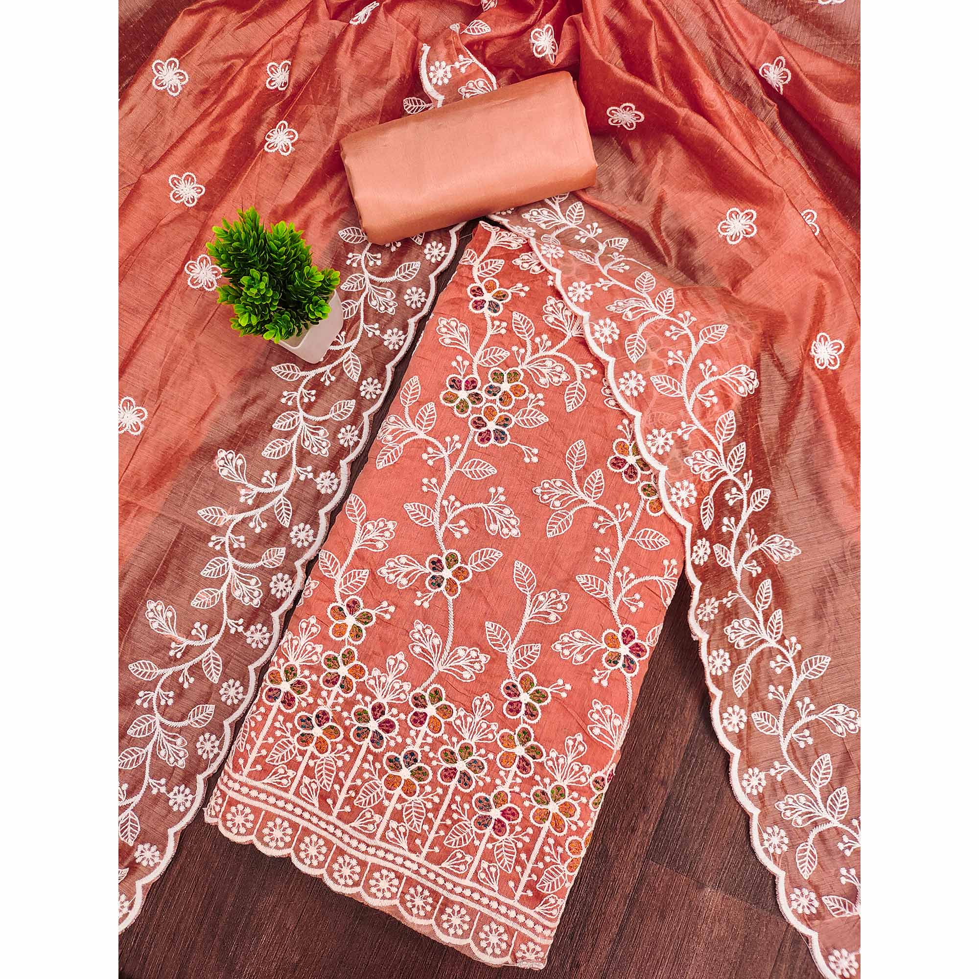 Orange Chanderi Cotton Dress Material Adorned With Elegant Floral Thread Embroidery Work