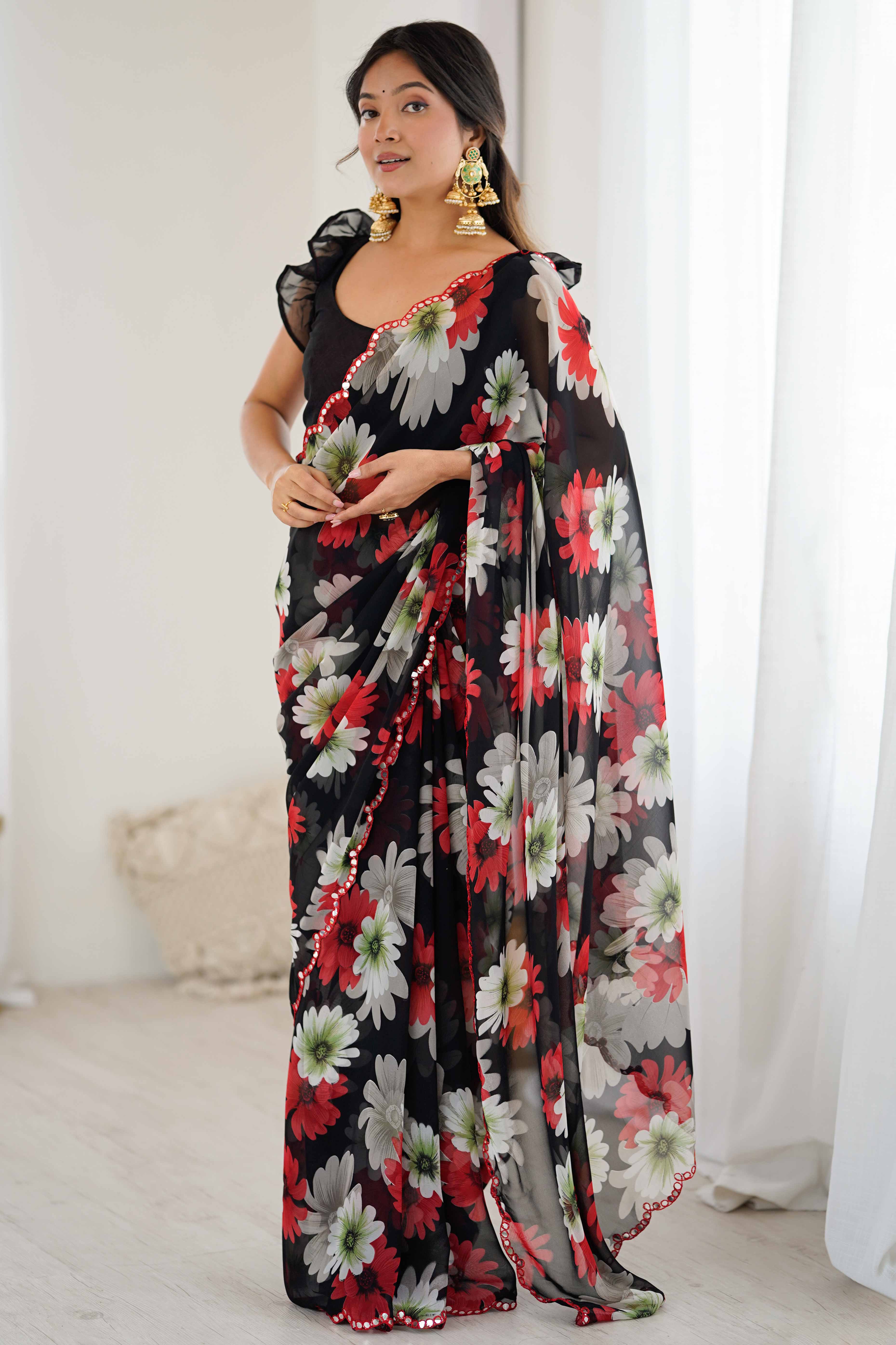 Black Georgette Saree Featuring Floral Prints & Shimmering Mirror Work Border