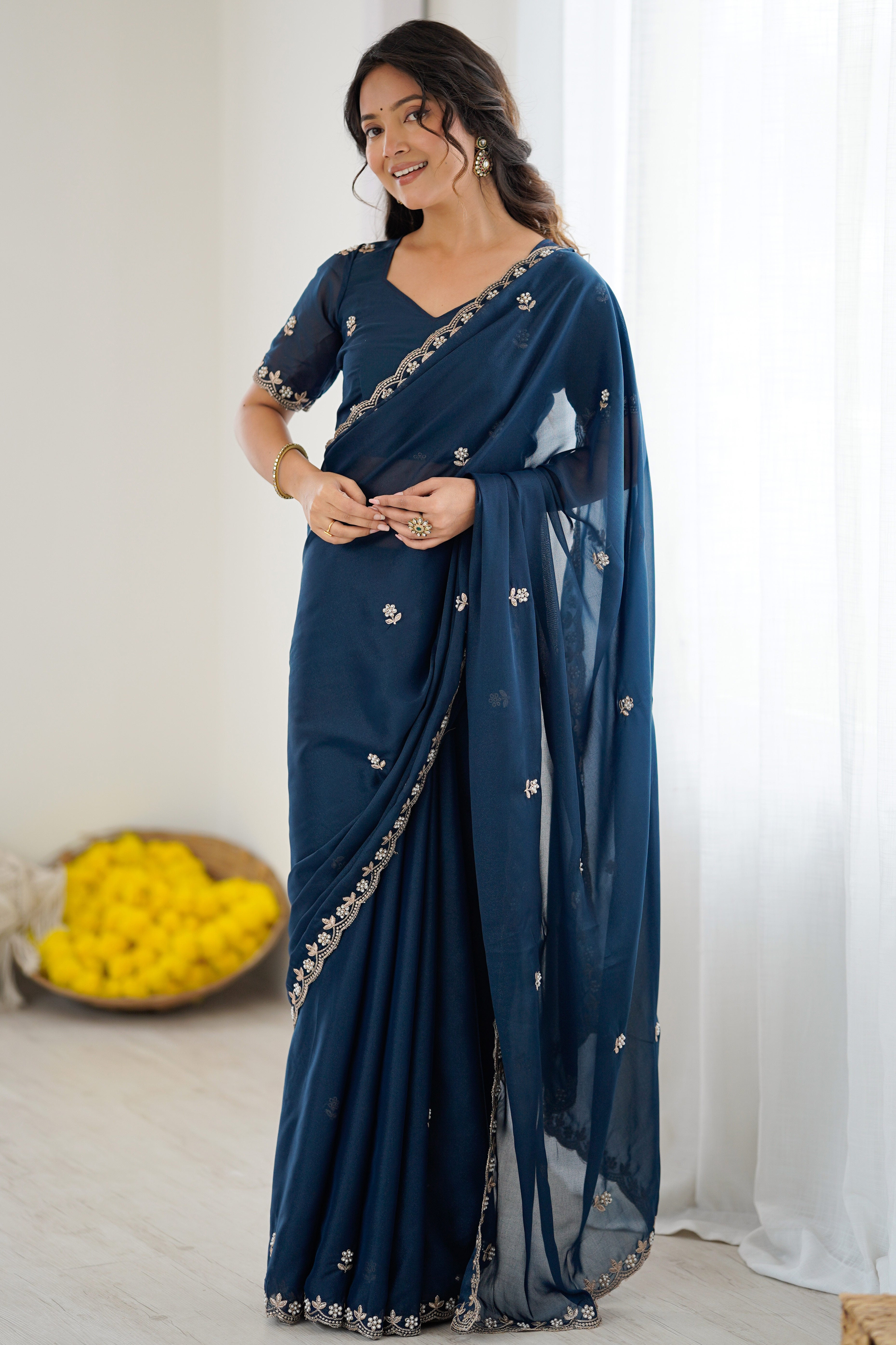 Blue Partywear Star Georgette Saree Adorned with Floral Embroidery and Beads Work