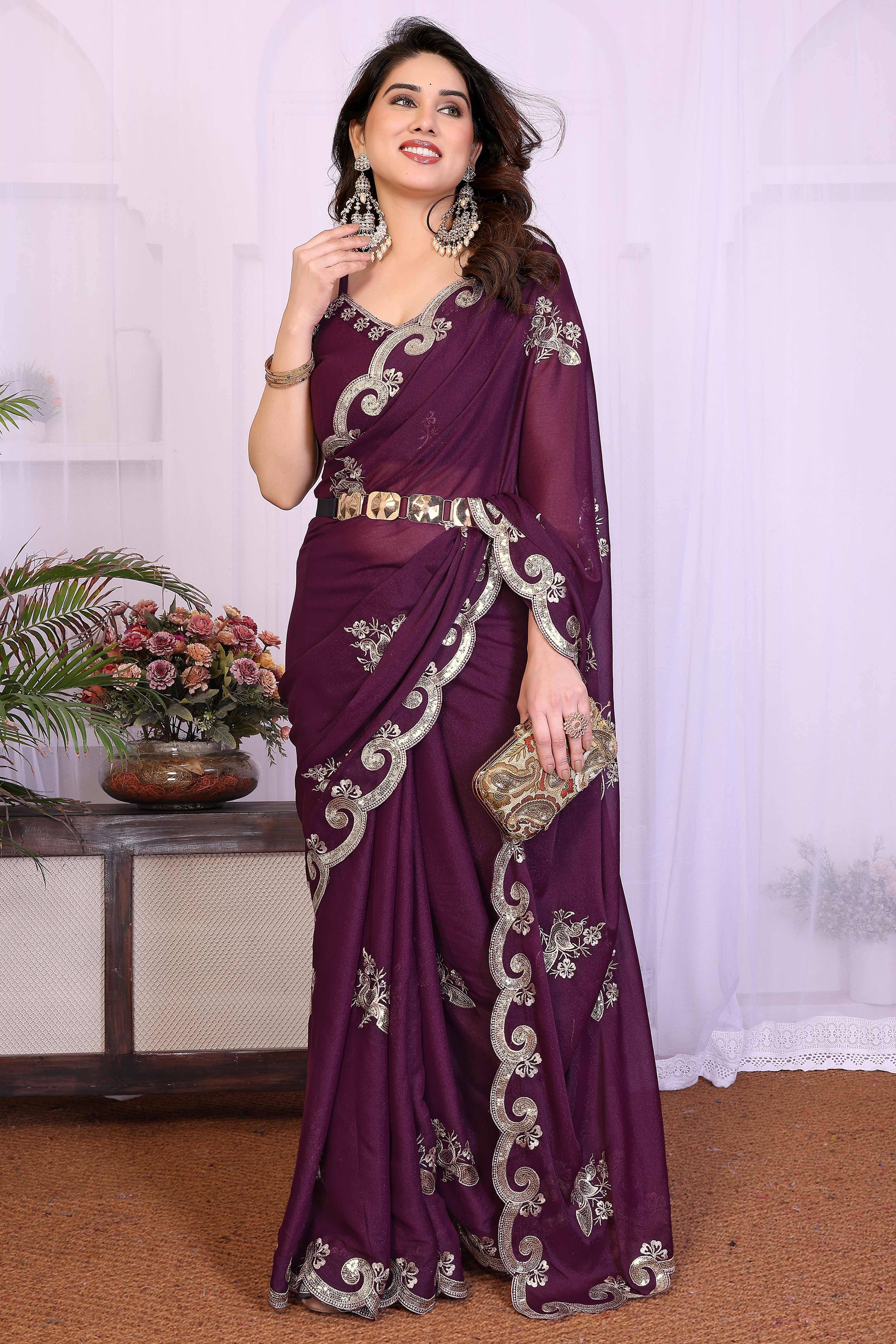 Charming Wine Floral & Peacock Motif Georgette Saree Enhanced With Sequins Embroidery