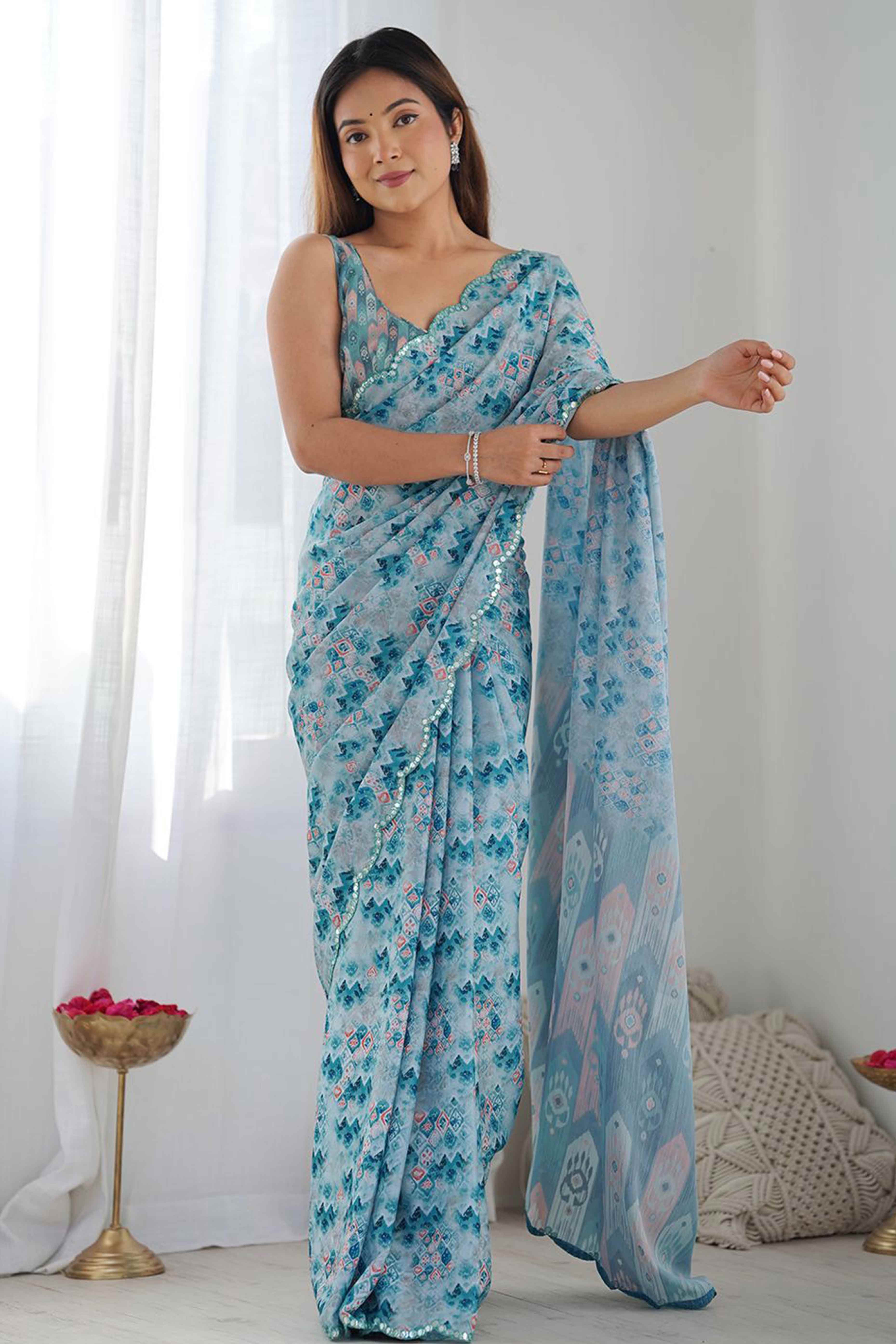 Light Blue Geometric Digital Print Georgette Saree Enhanced With A Sparkling Lace Border