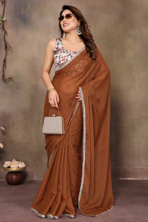 Brown Solid Sparkling Georgette Saree Enhanced With Shimmering Mirror Border
