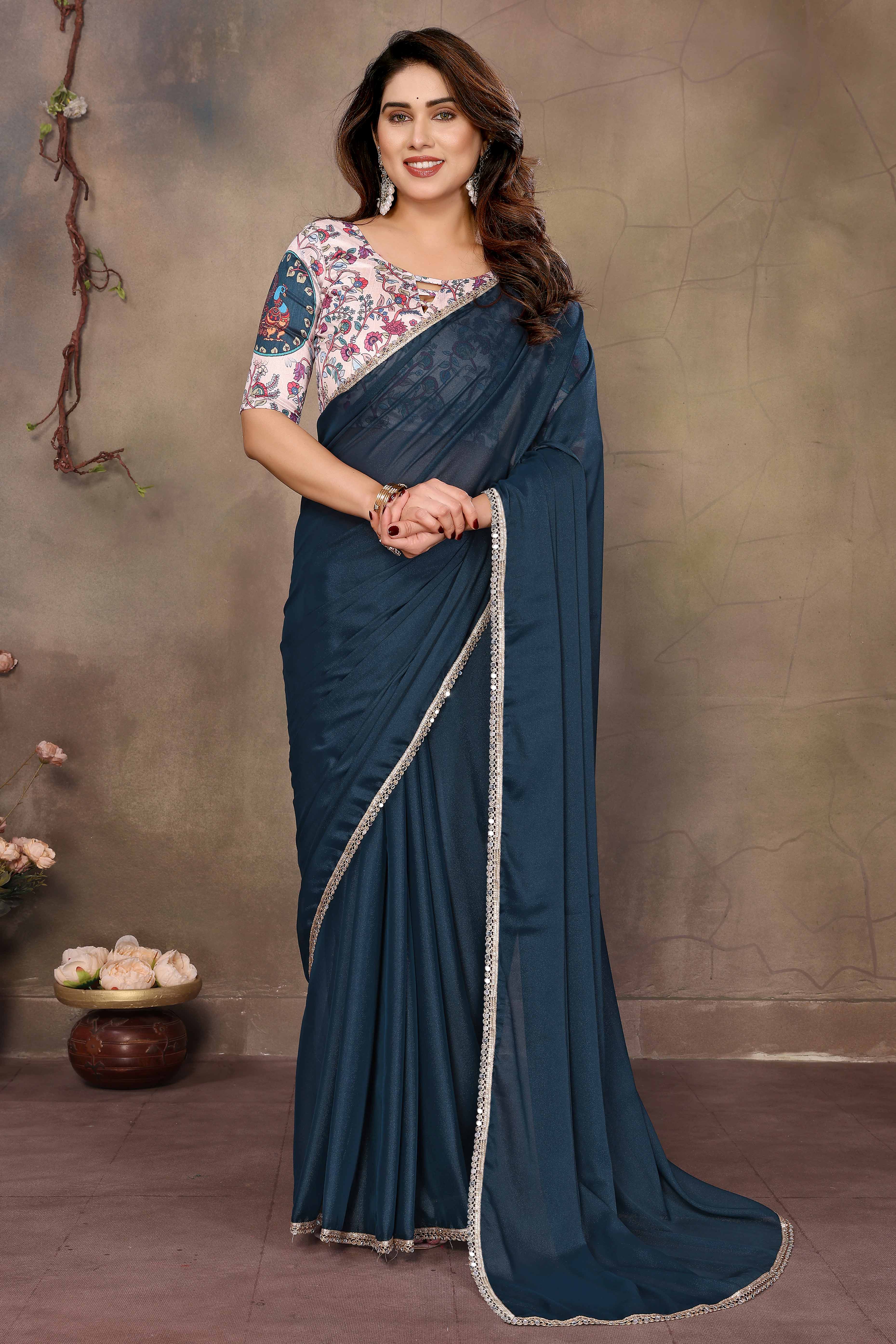 Morpich Blue Solid Sparkling Georgette Saree Enhanced With Shimmering Mirror Border