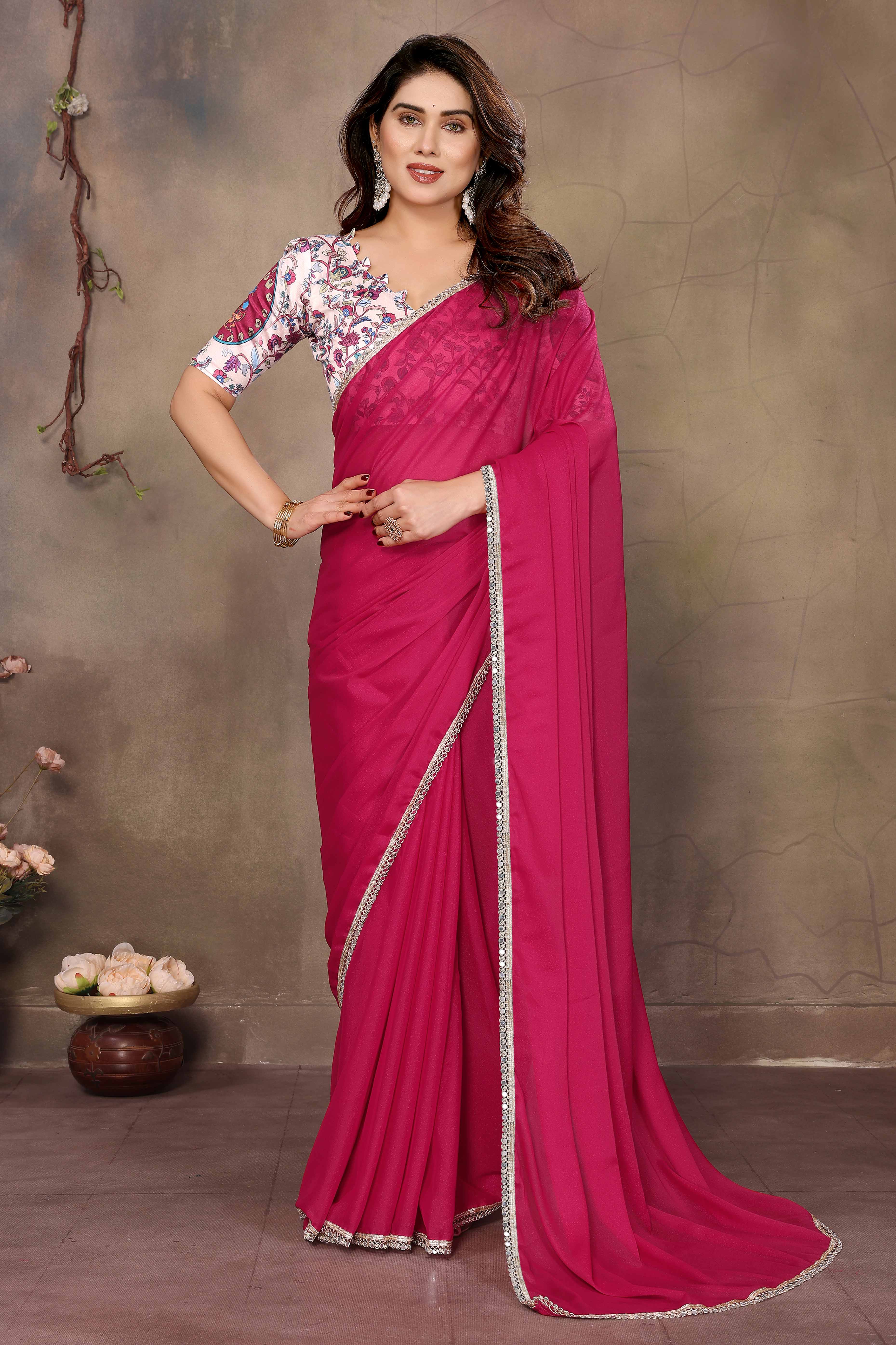 Pink Solid Sparkling Georgette Saree Enhanced With Shimmering Mirror Border