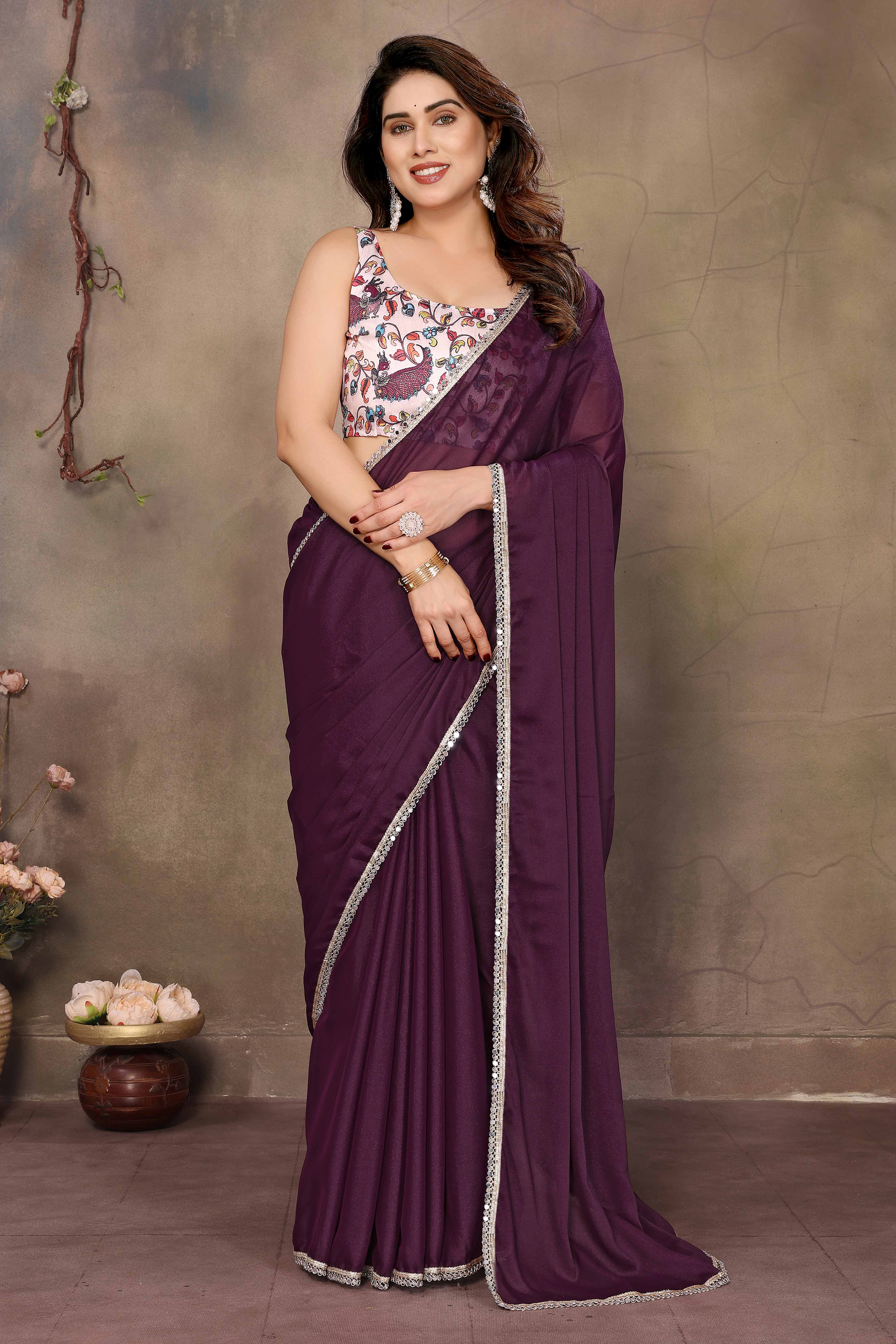 Wine Solid Sparkling Georgette Saree Enhanced With Shimmering Mirror Border