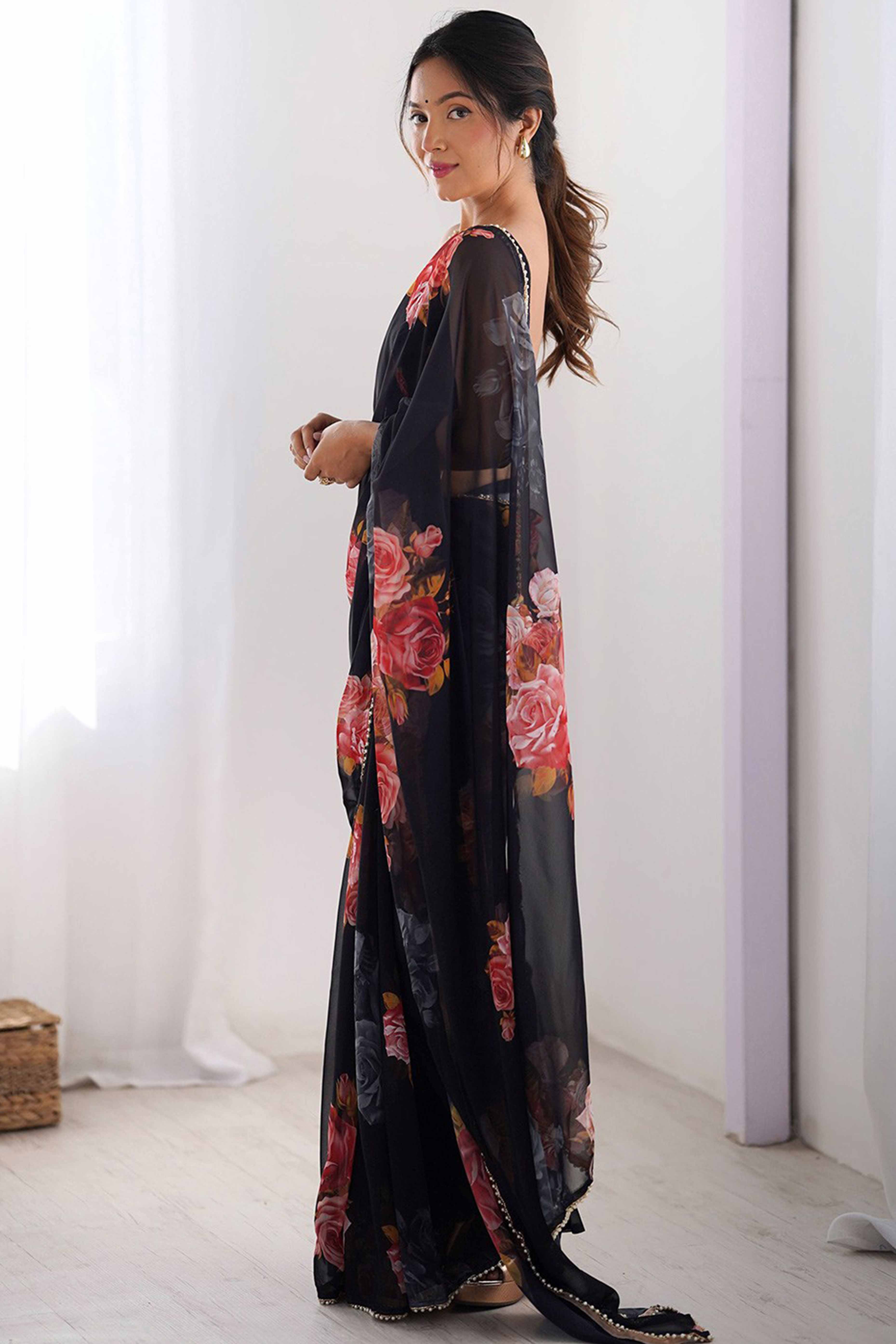 Partywear Black Georgette Saree with Floral Prints and Bead Work Lace