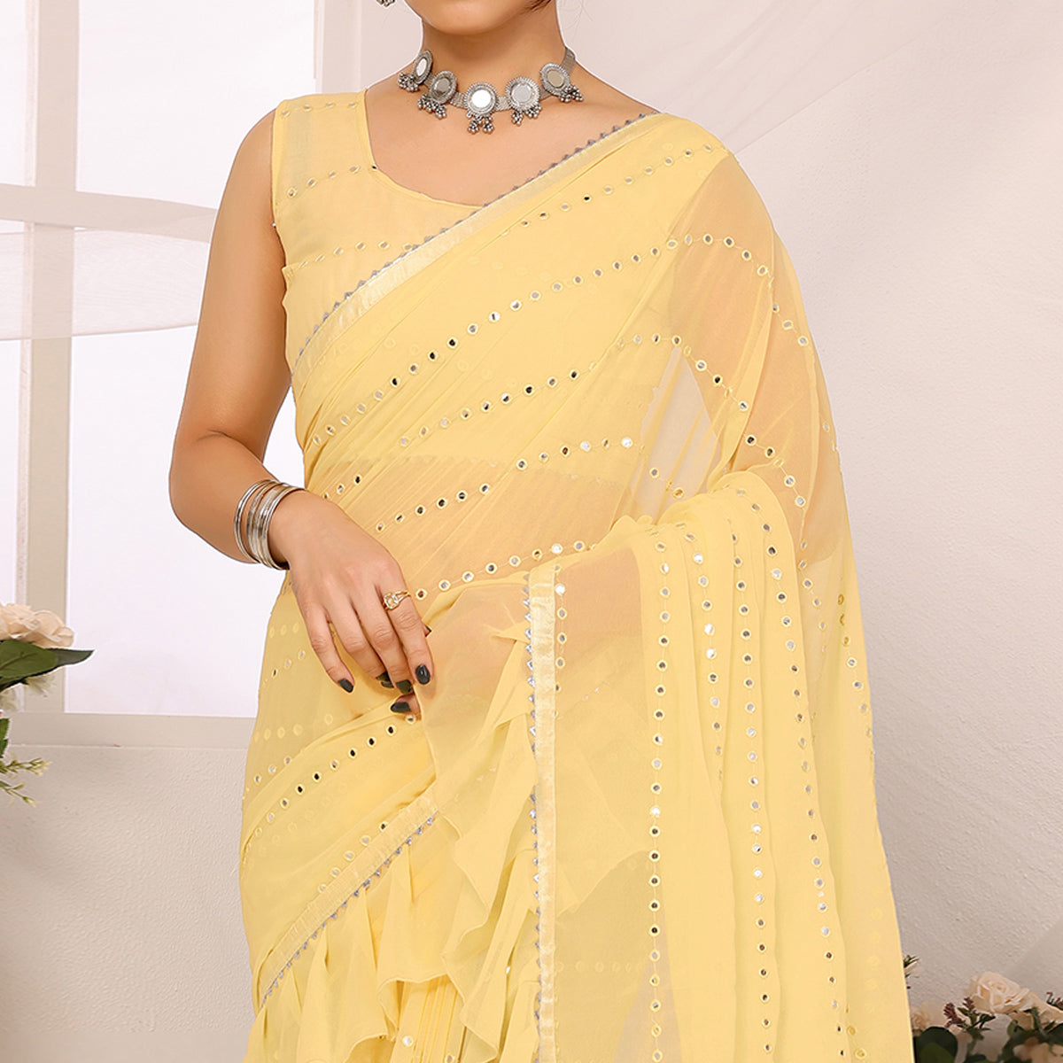 Yellow Mirror Work Embroidered Georgette Saree With Ruffle Border