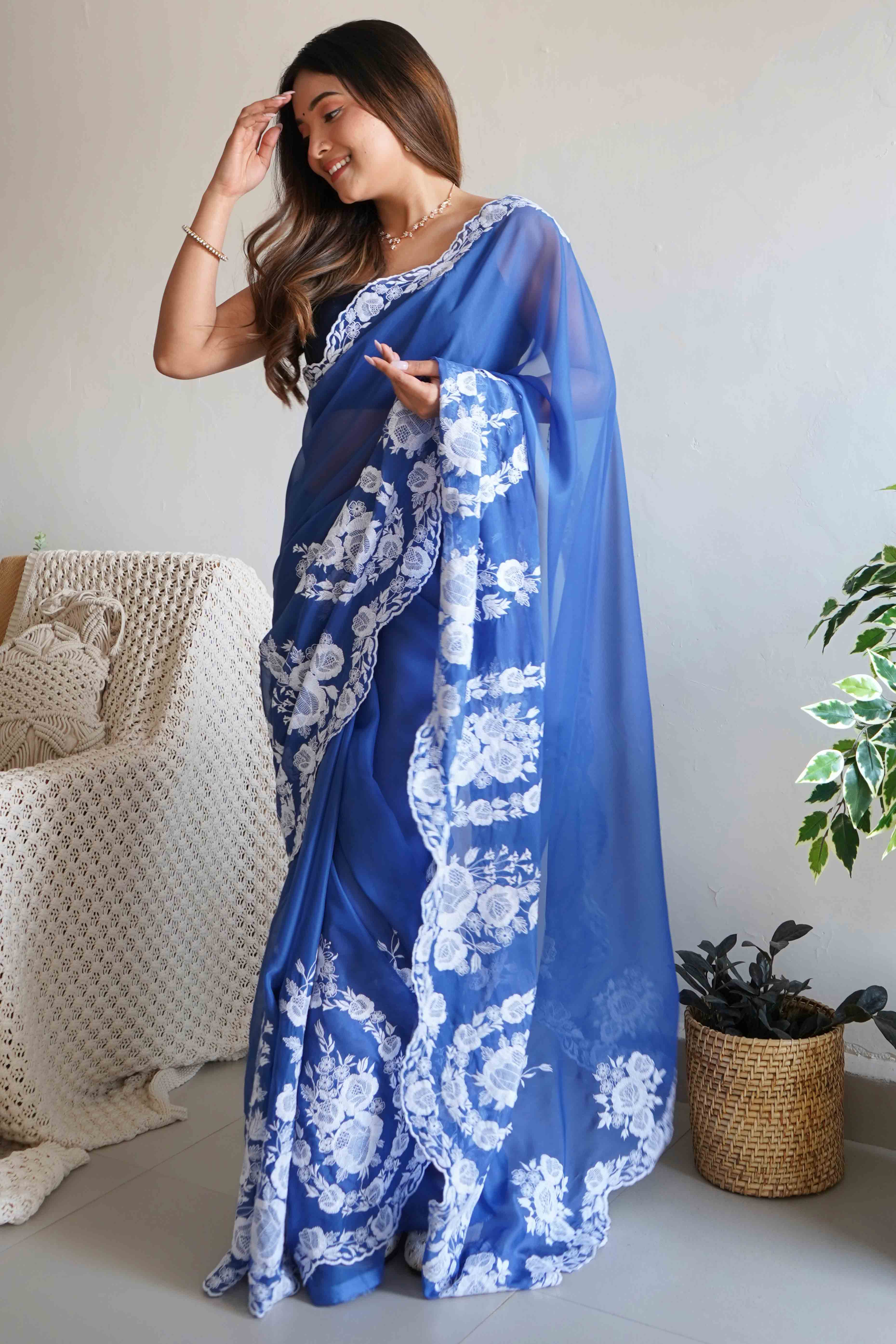 Blue Embroidered Georgette Saree Featuring Ornate Heavy Thread Work