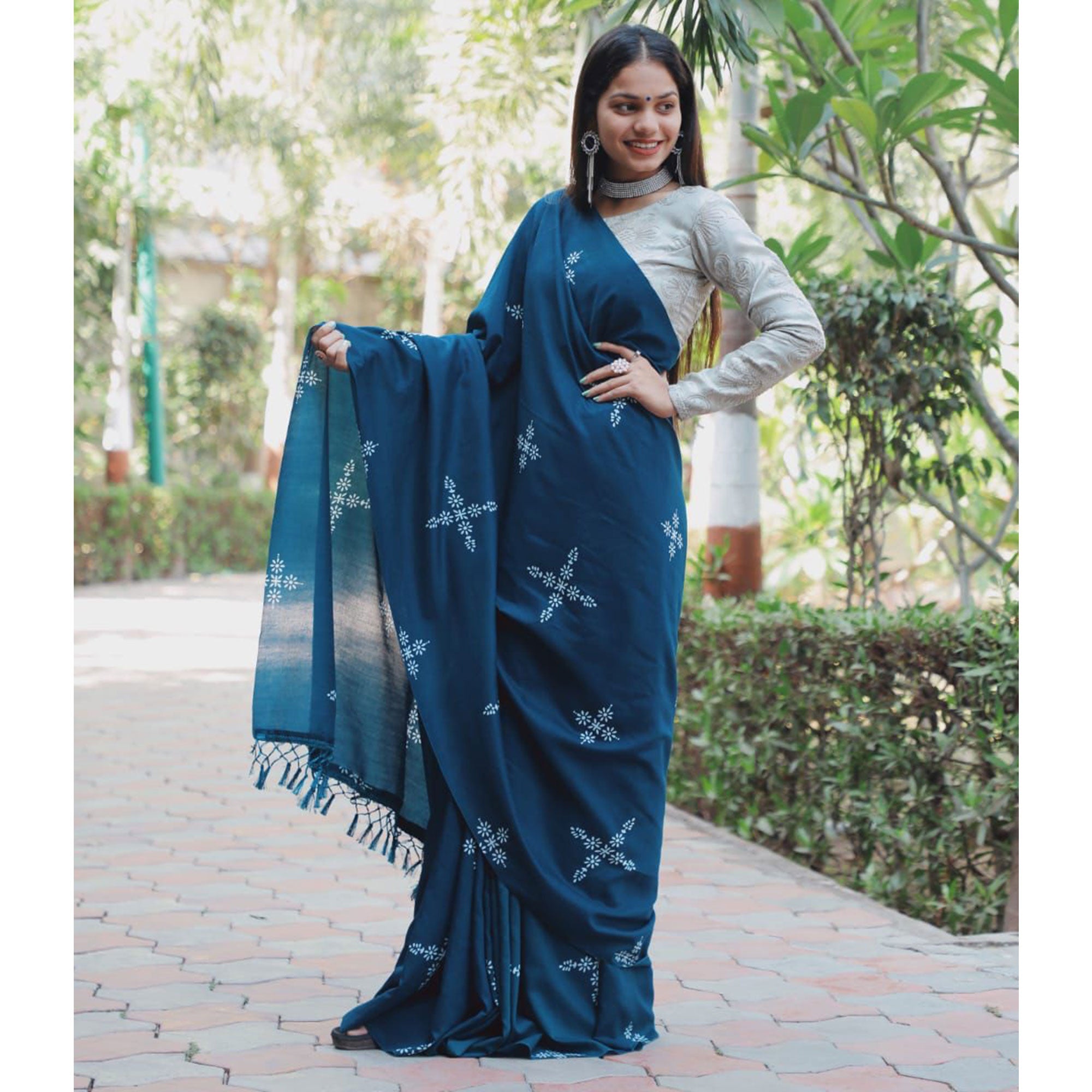 Teal Blue Floral Printed Muslin Saree With Tassels