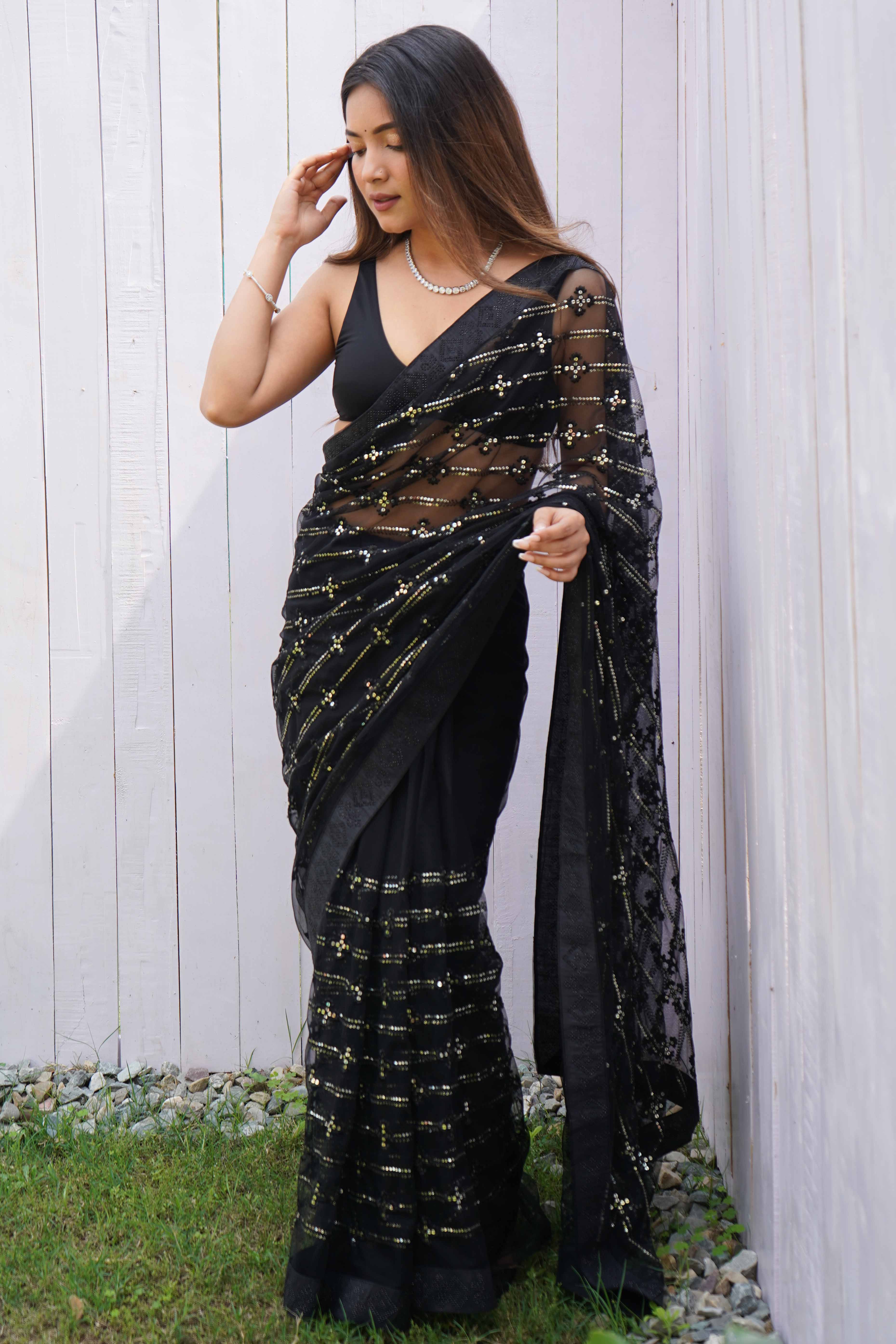 Black Net Saree Featuring Intricate Thread & Sequins Work With A Luxe Diamond Border