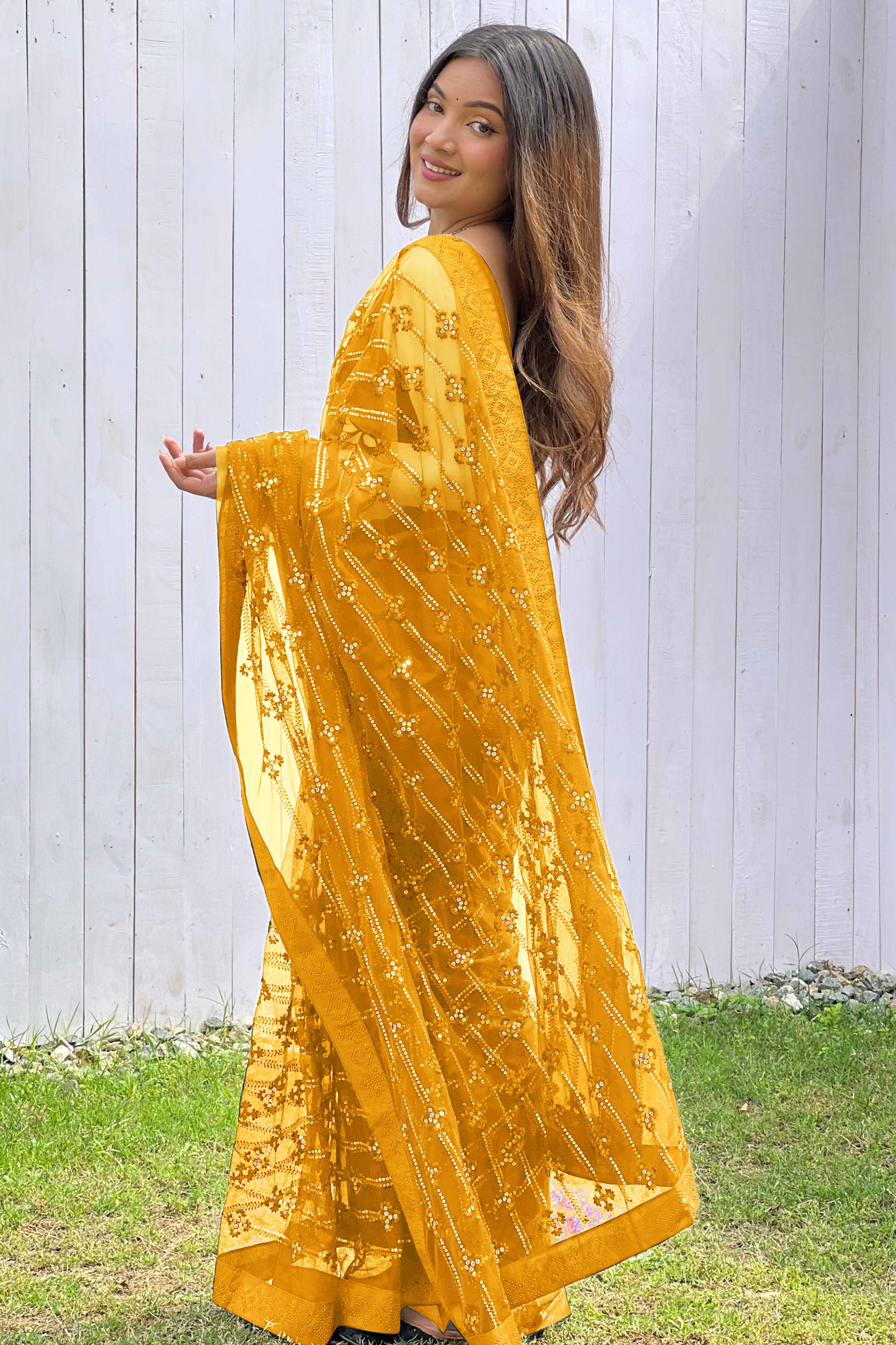 Mustard Net Saree Featuring Intricate Thread & Sequins Work With A Luxe Diamond Border