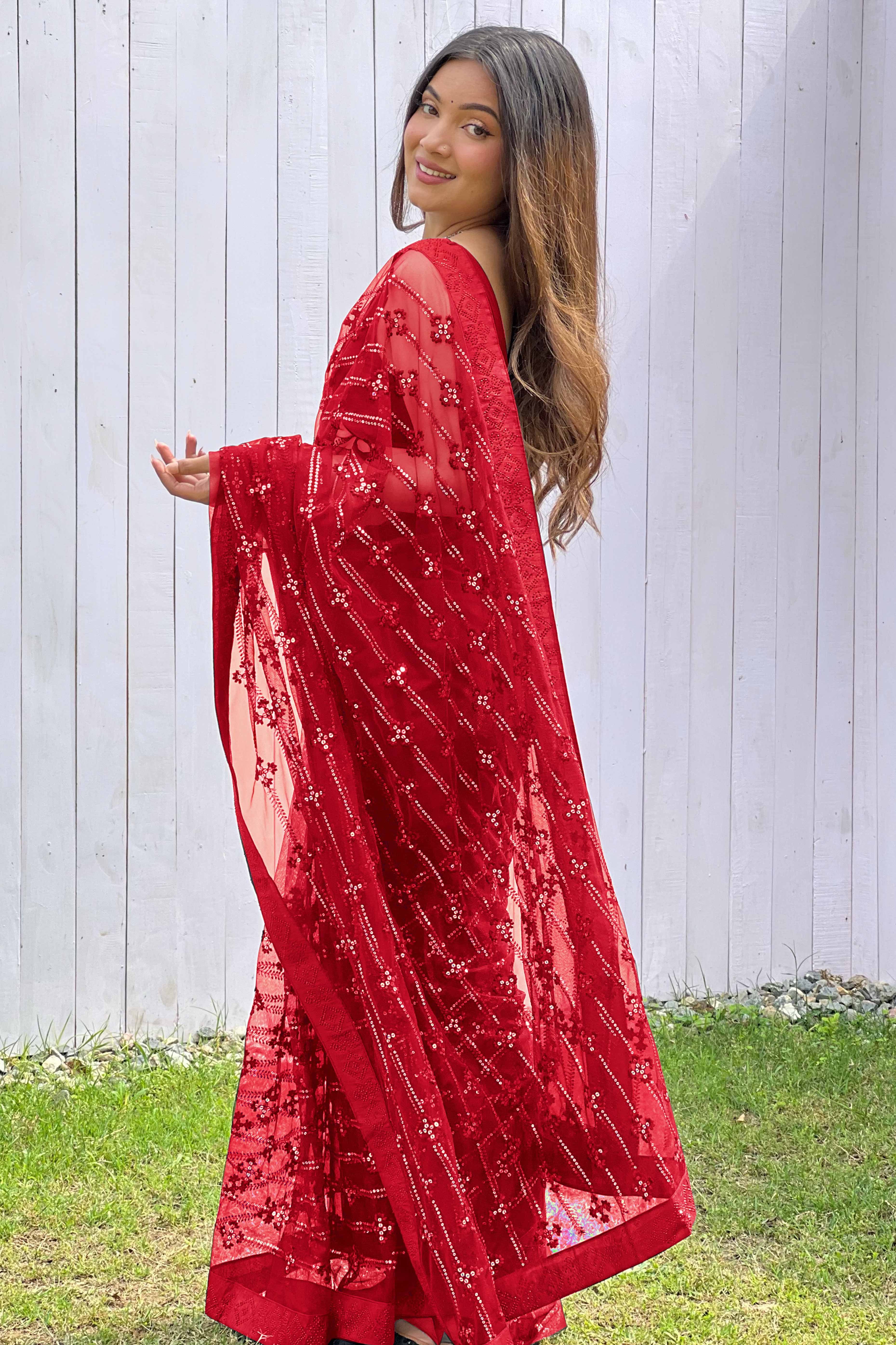 Red Net Saree Featuring Intricate Thread & Sequins Work With A Luxe Diamond Border