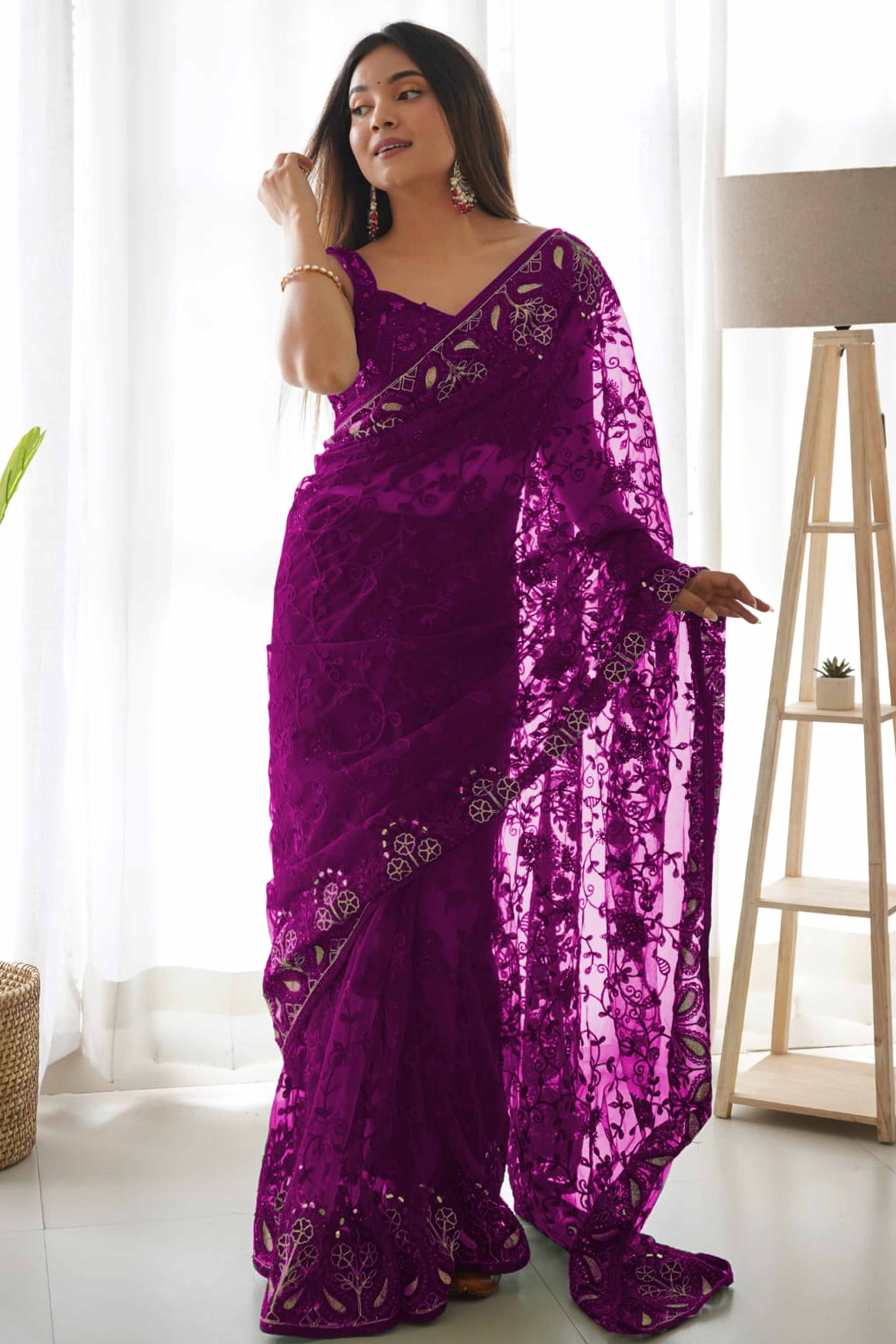 Purple Net Saree With Floral Thread Embroidery Adorned In Stone & Mirror Accents