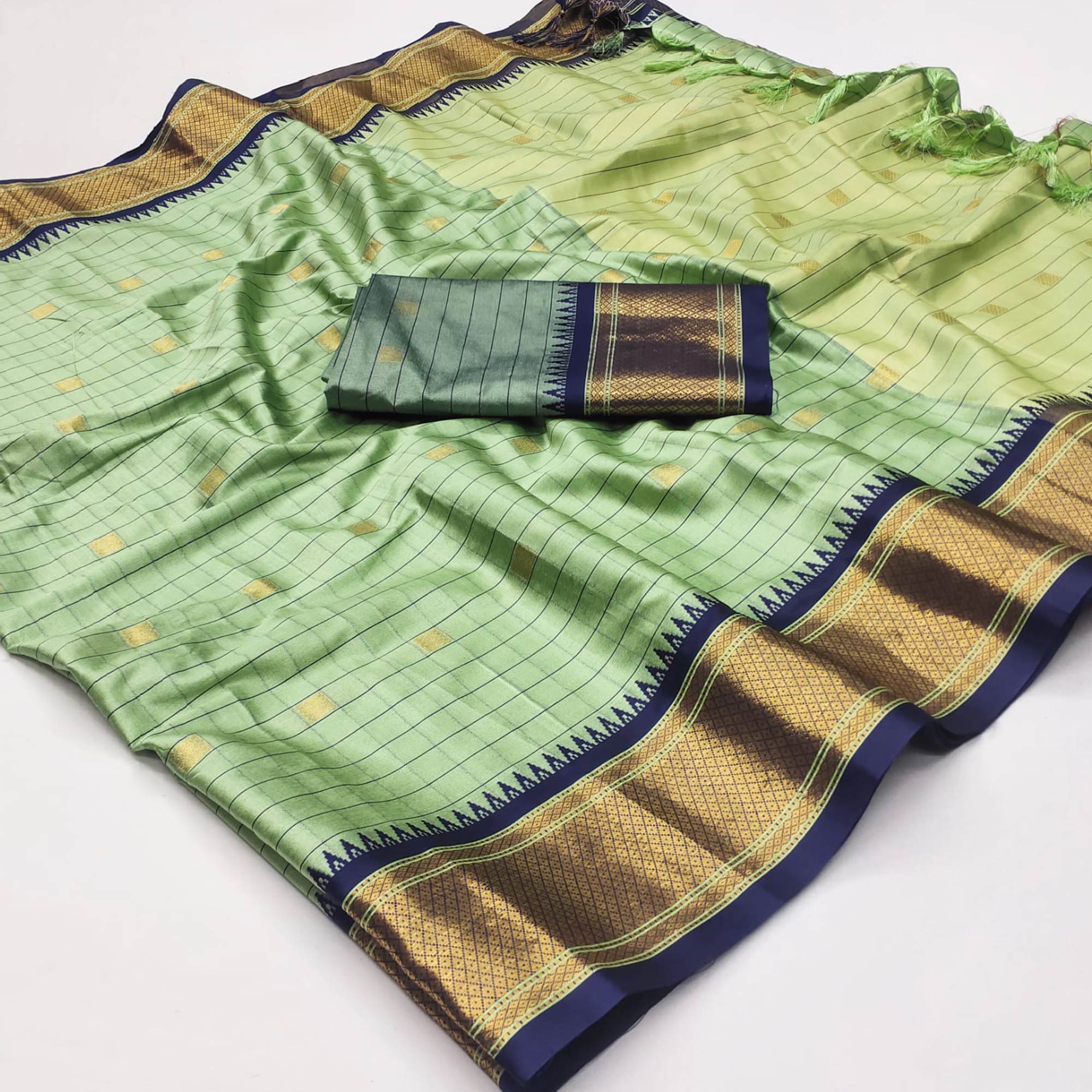 Pista Green Woven Cotton Silk Saree With Tassels